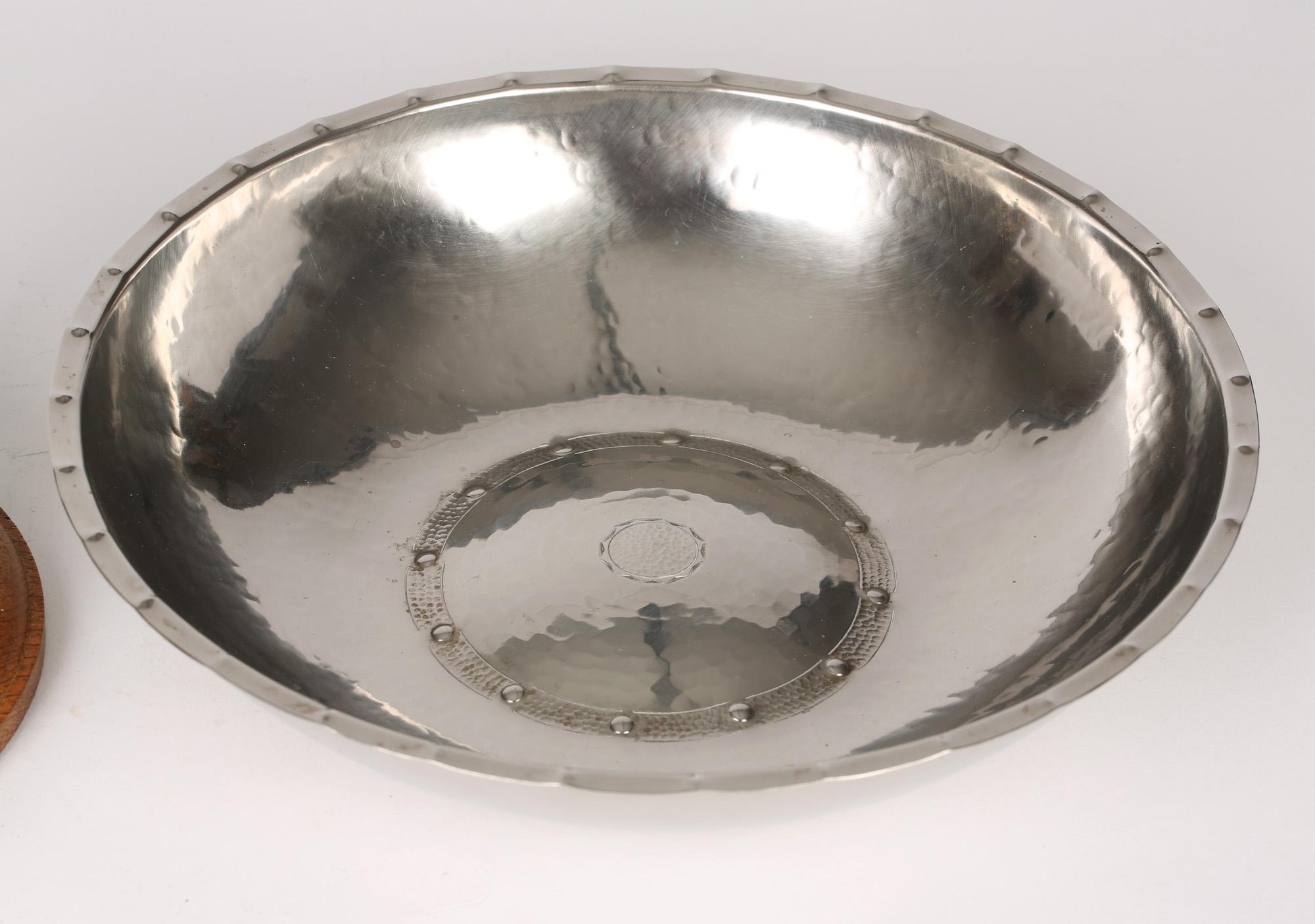 A very stylish, rare unique mid-century English hand beaten 'Staybright' presentation bowl on stand designed by Stanley Watson for Lakeland Rural Industries around 1955. The bowl of wide rounded shape is hand beaten and formed from a single metal