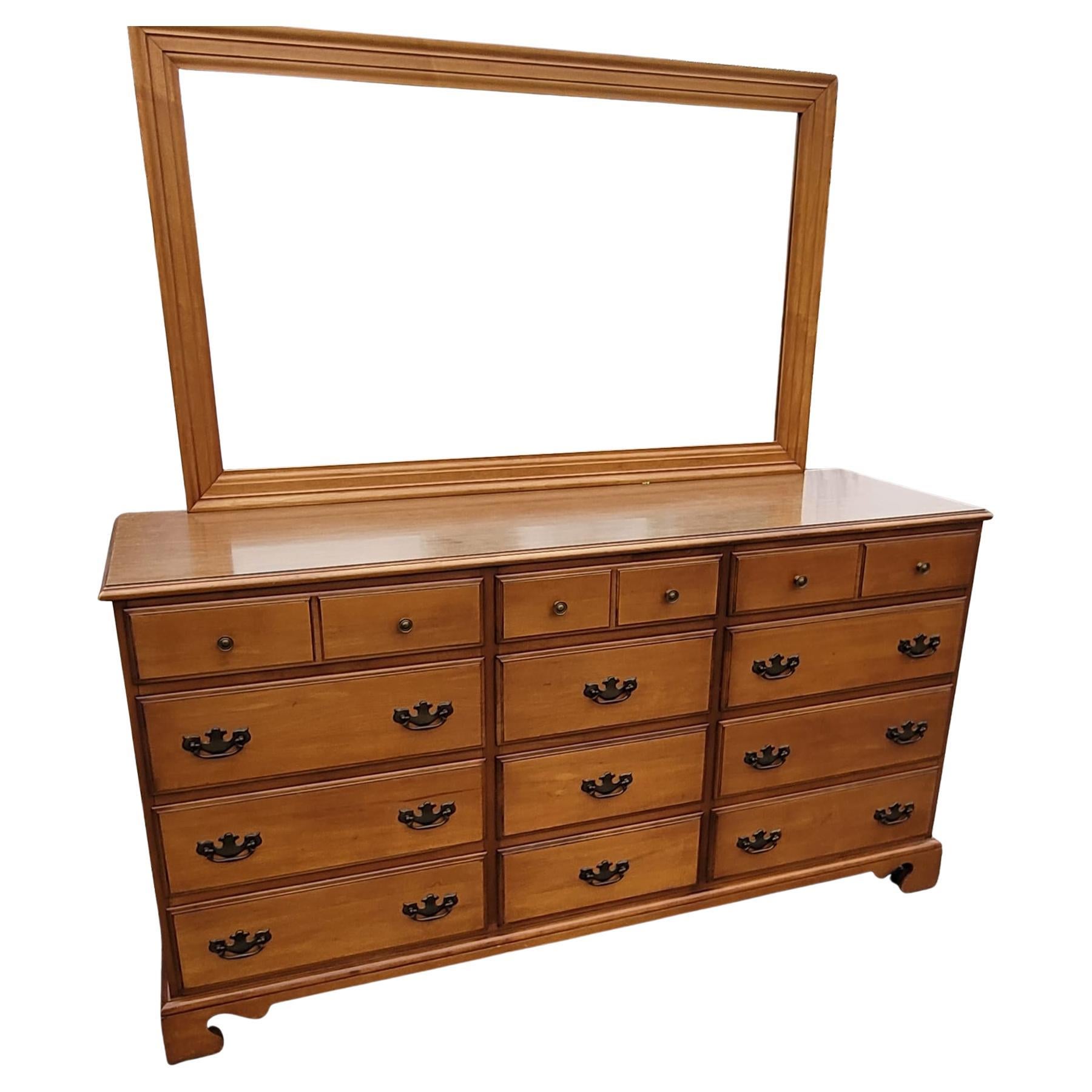 Beautiful set of Stanley's Distinctive Furniture Collection Maple dresser with Mirror and Chest of Drawers Set in great condition. Measures 66