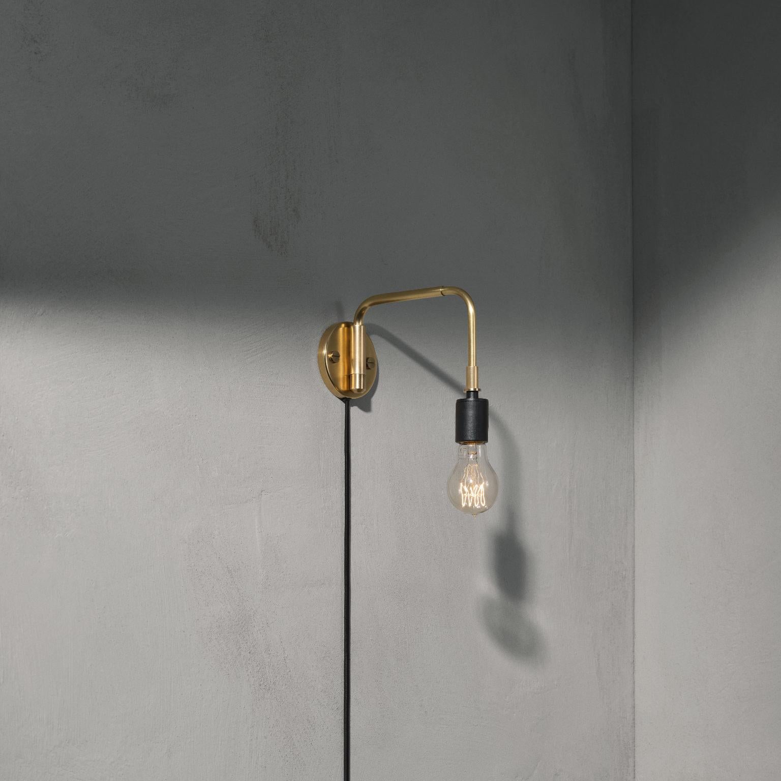 Scandinavian Modern Staple Wall Lamp, Black, and One Tr Matte Bulb For Sale