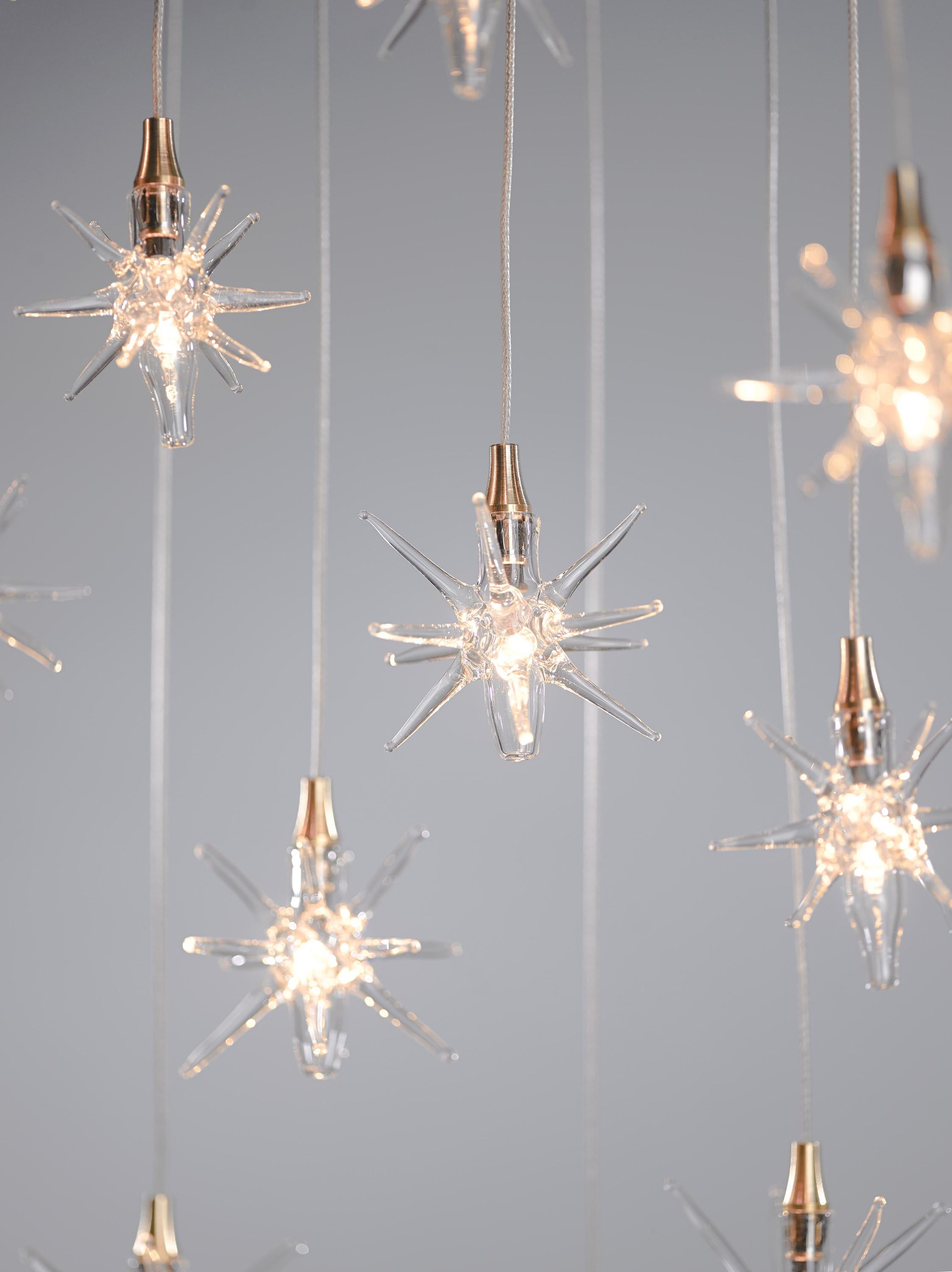 Hand blown glass pendants fixtures. 22 glass pendants on 18