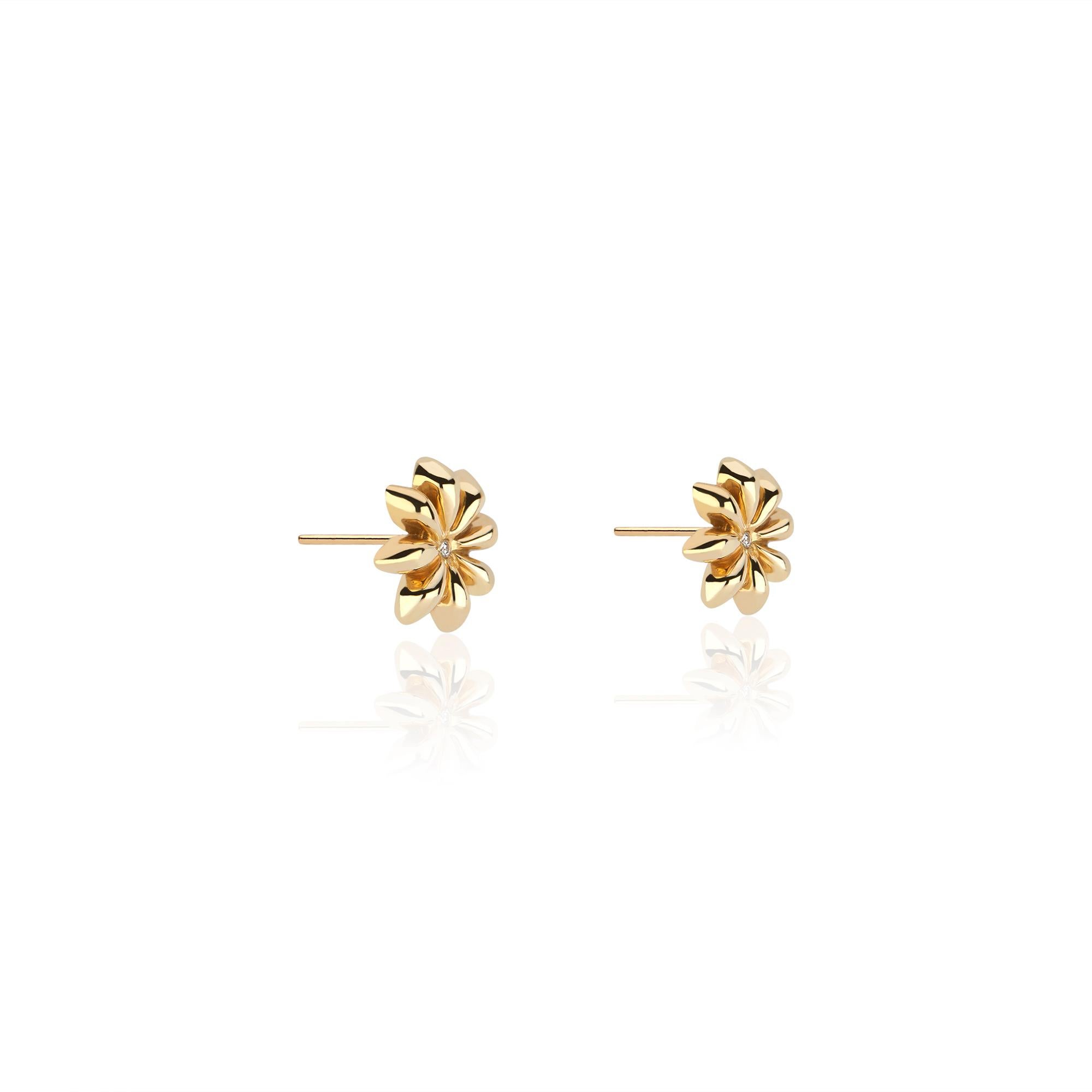 Stud earrings modeled after the aromatic star anise, with a diamond in the center (.015 tcw). 22k yellow gold. Also available in 18K yellow gold.