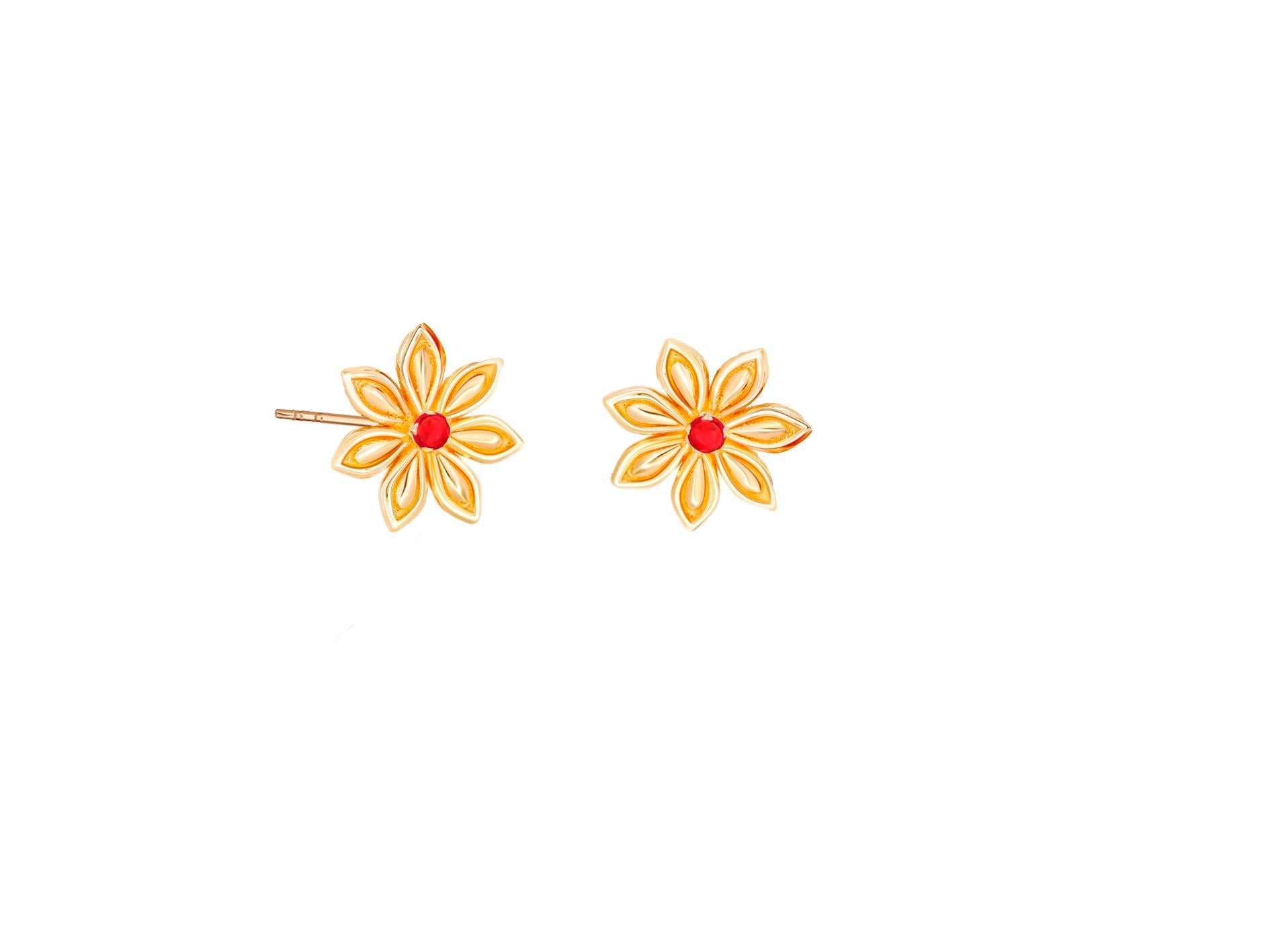 Star Anise Flower 14k gold earrings. Round ruby earrings. Danity gold earrings. Flower earrings studs with rubies in 14k gold.
Metal: 14k gold
Weight: 2 gr
Central stone: Rubies- 2 pieces
Cut: Round
Weight: aprx 0.25 ct. total.
Color: red
Clarity: