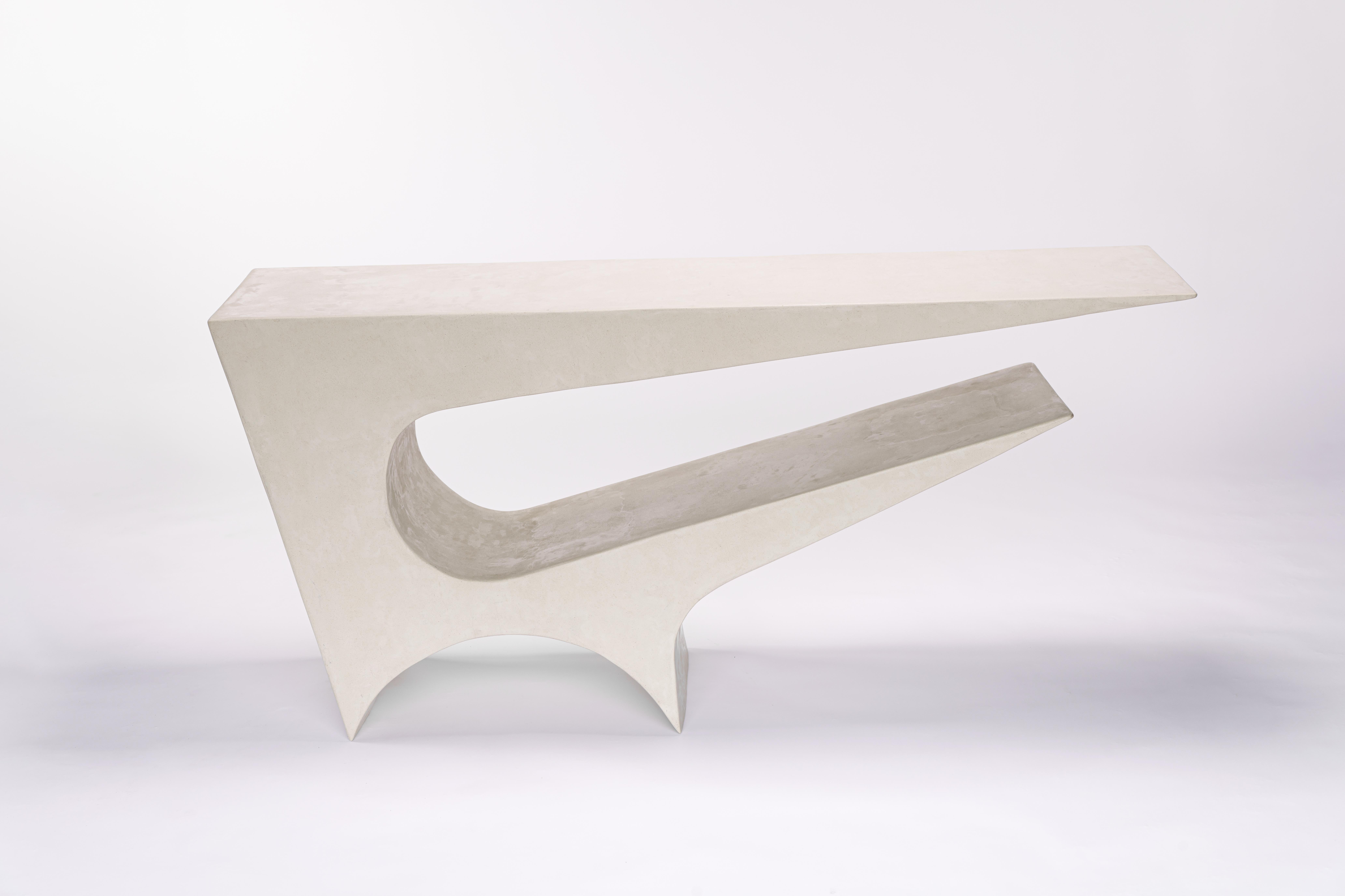 Star axis console in polished concrete by Neal Aronowitz Design
Dimensions: D 43.2 x W 169 x H 77.5 cm
Materials: Light beige concrete.
Custom sizes and colors are available. 

This modern, minimalist side table by award-winning artist/designer