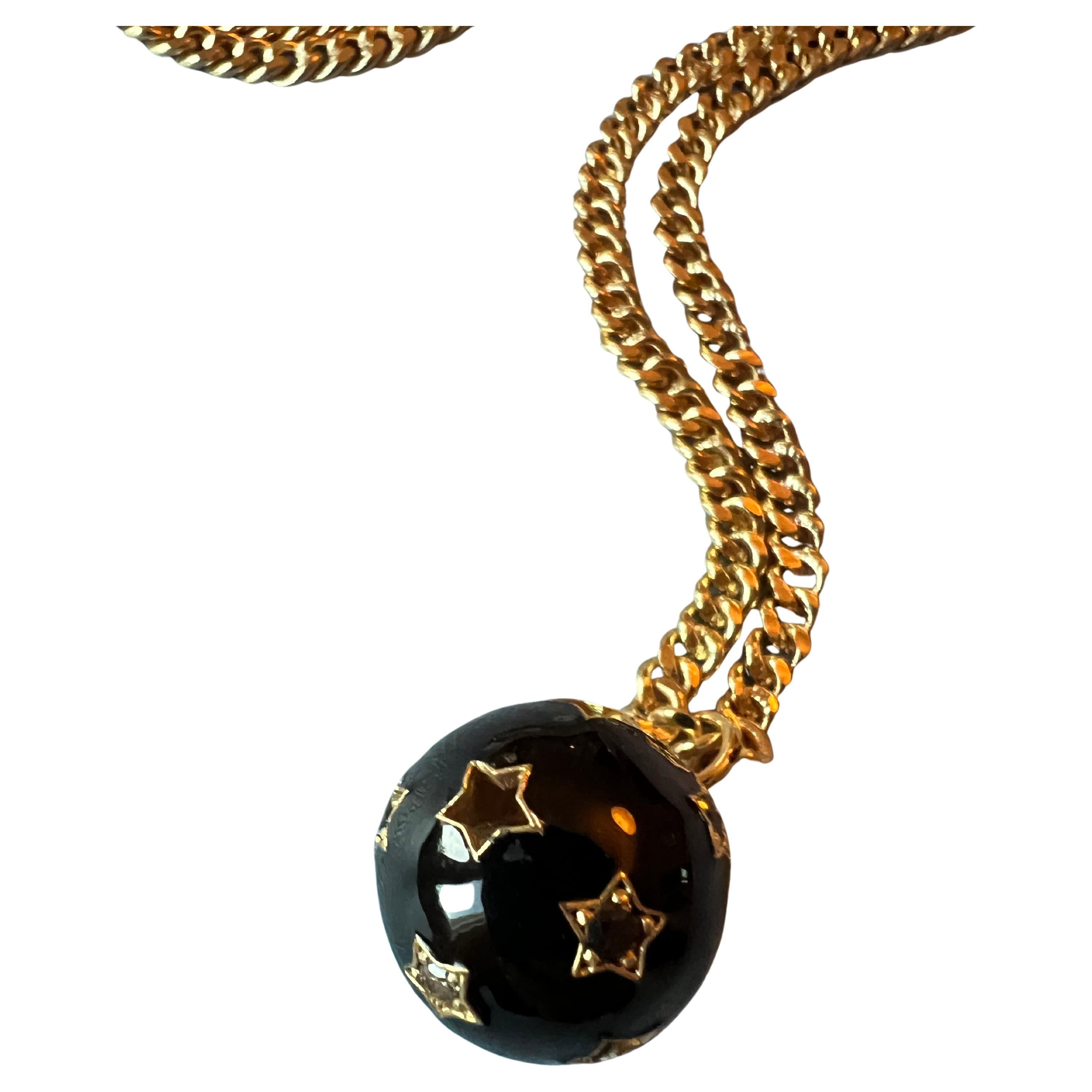 Star Ball Pendant Necklace Black Diamond White Diamond Black Enamel

Material Gold plated Brass

Length: Long 28