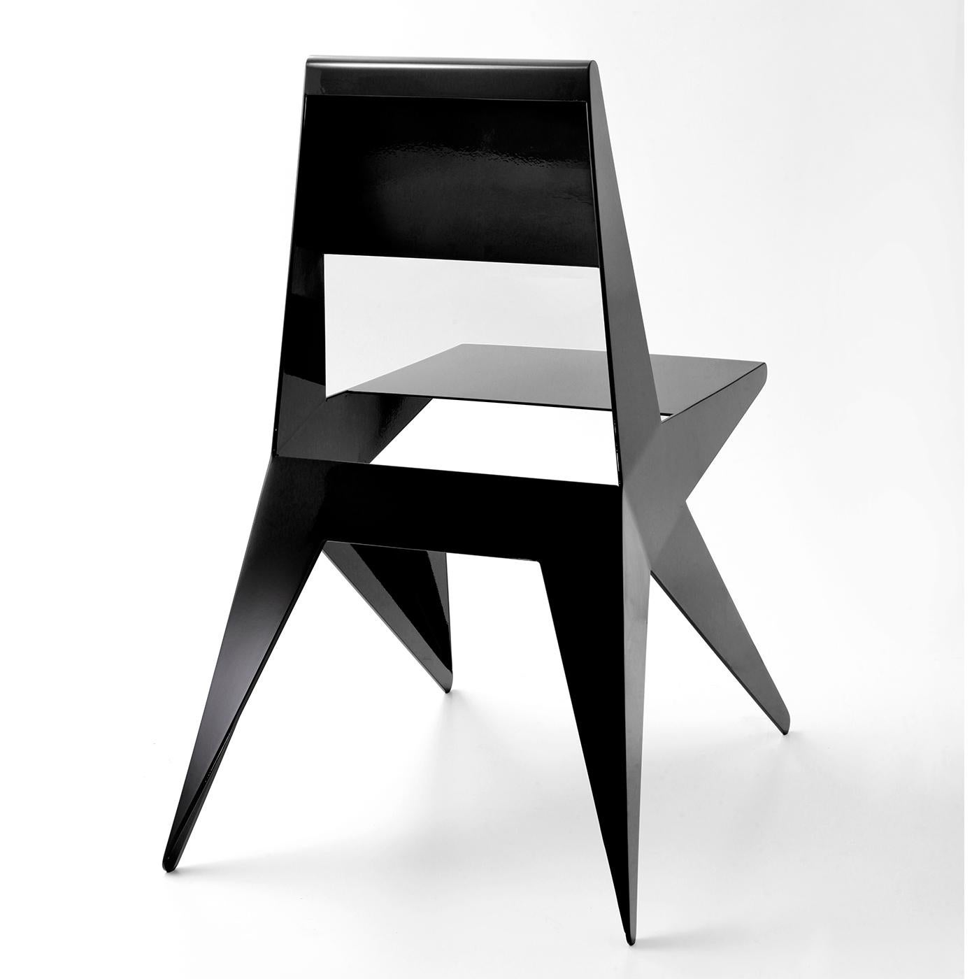 Bent, welded, and finished entirely by hand, this unique chair features an angular Silhouette crafted using a thin aluminum sheet. Legs, seat, and back extend from a core like the points of a star. The black lacquered finish enhances the bold look