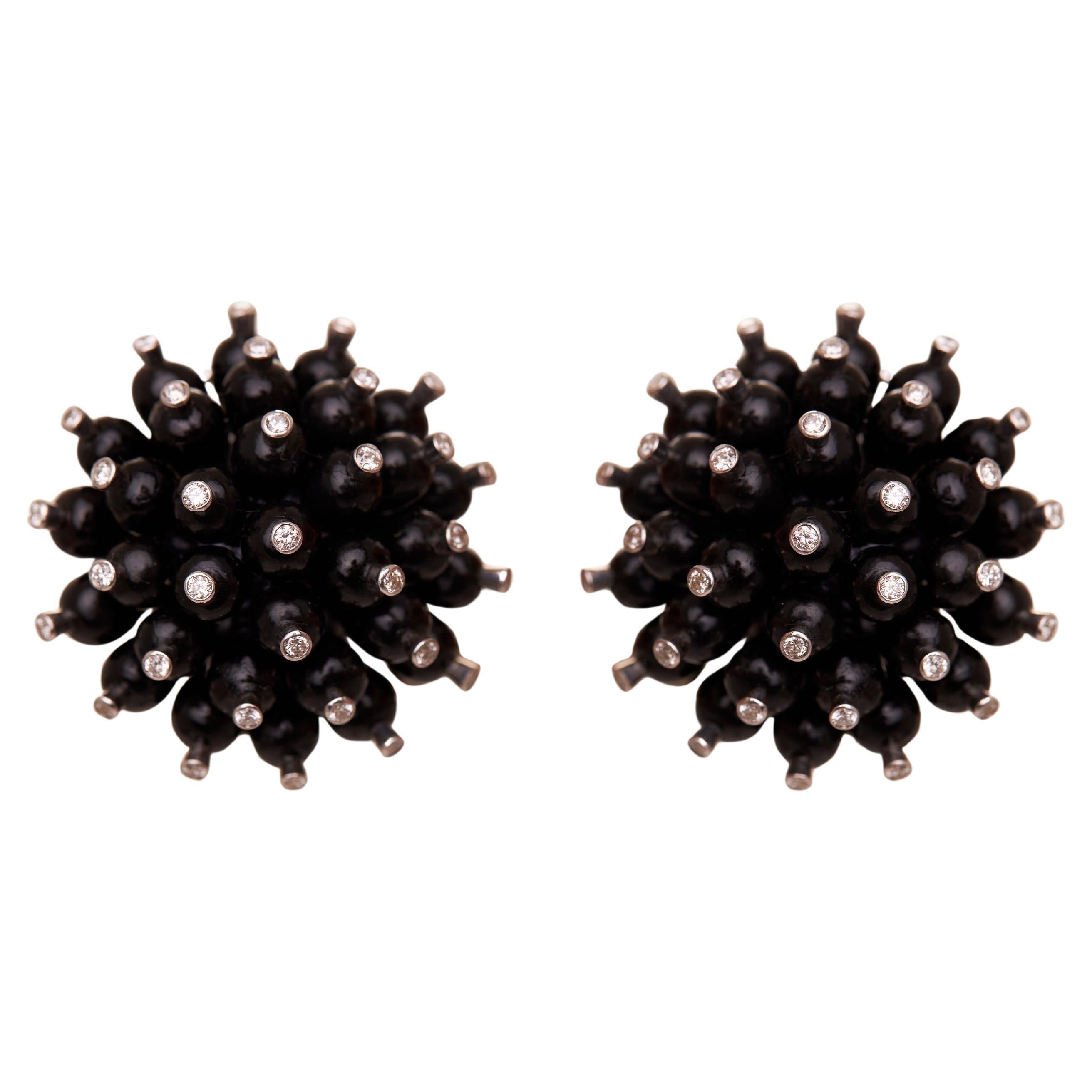 Orecchini Star Burst in oro 18kt, onice nero e diamanti