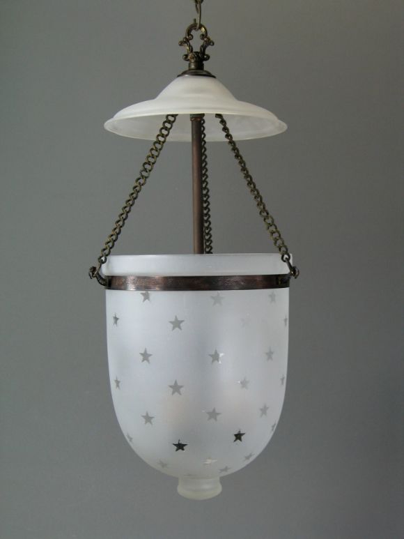 Blown frosted glass with an etched star pattern.
Supplied with additional 2 feet of chain and canopy



One 100 watt Edison base socket.