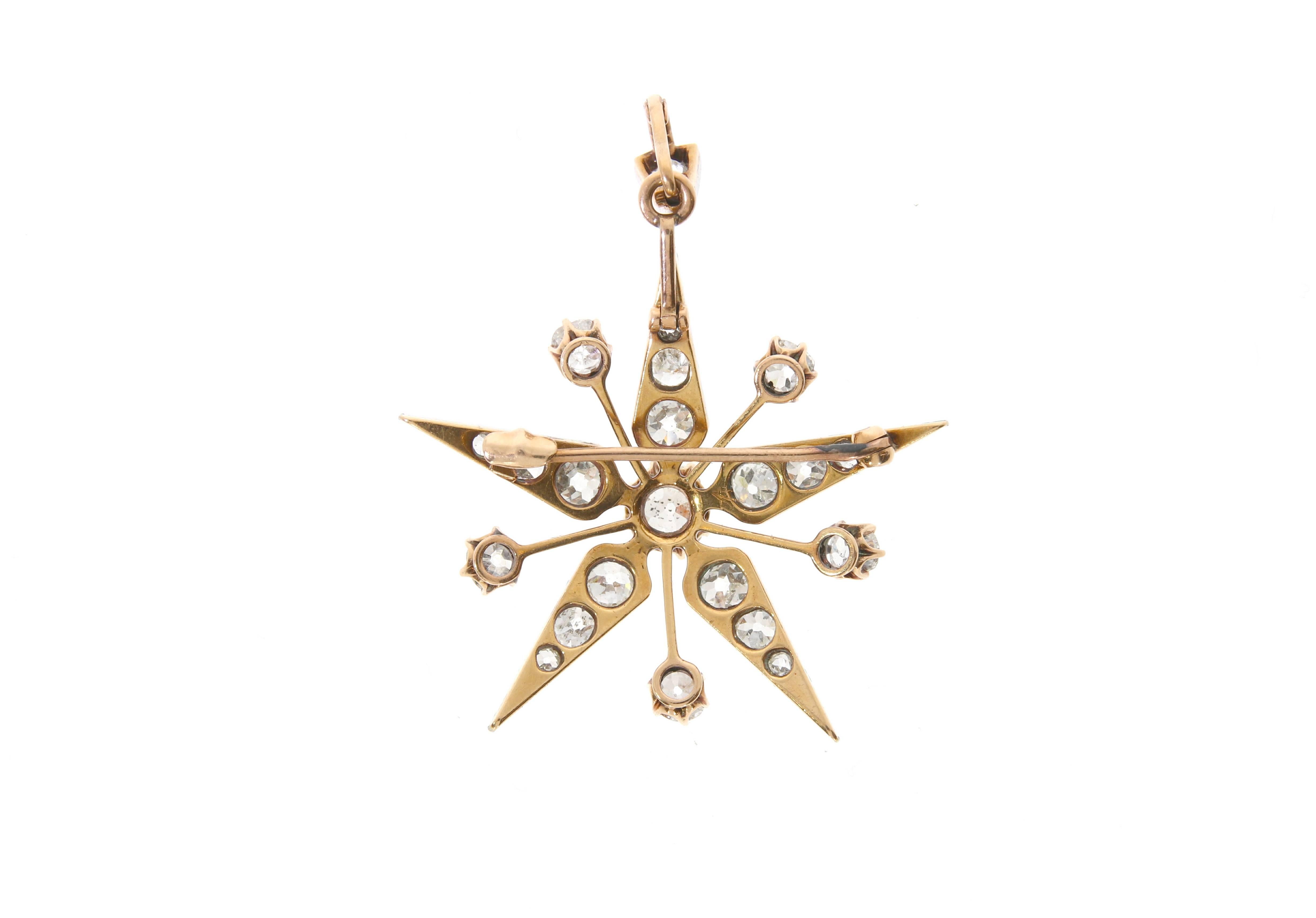 A delicate antique diamond pendant, shaped like a star. Of open cluster design, set with 23 brilliant cut diamonds (in total approx: 3,90 carats) and connected by a knife edge linking. Suspended from a detachable pendant bail. Can also be worn as a