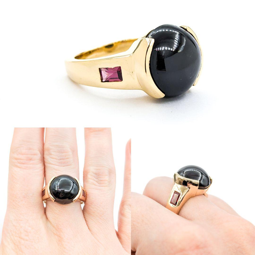 Star Diopside & Garnet Ring In Yellow Gold

Introducing this beautiful Gemstone Fashion Ring crafted in 14kt yellow gold. The ring features a .38ct Garnet centerpiece and 16.38ct round Star Diopside. This elegant piece is a size 10 and can be