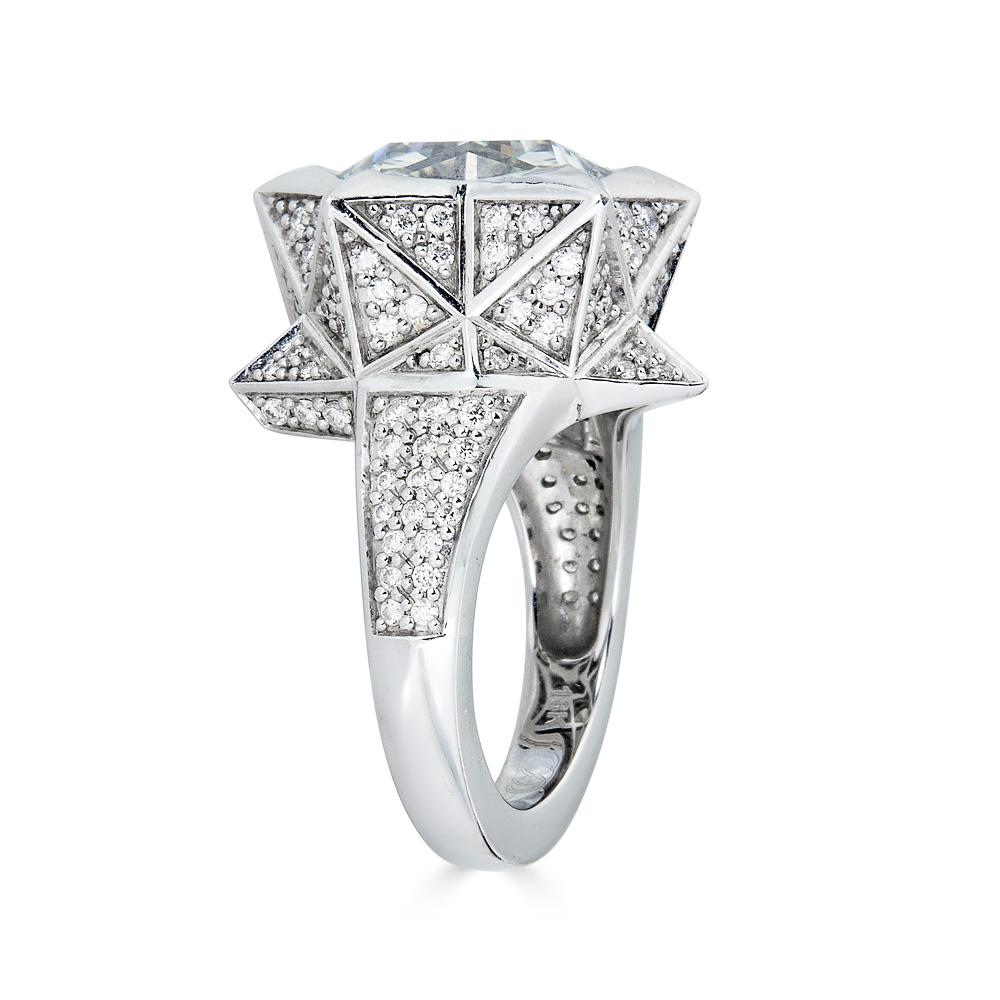 This unique engagement ring is unlike any other. Inspired by sacred geometry, namely the star tetrahedron. The Star Tetrahedron is two tetrahedrons combined, interlaced and balanced. This geometry is often referred to as the Merkabah. The star
