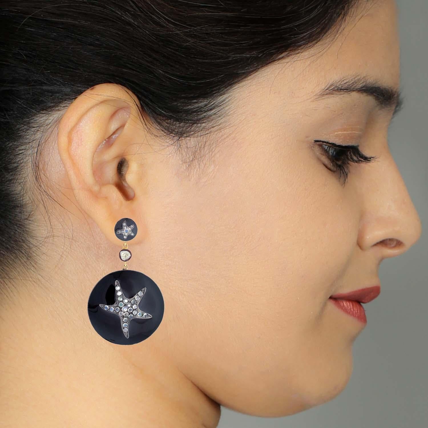 Star Fish Black Enamel Earring with Diamonds and Moonstone in gold and silver is lovely and perfect for tropical vacations.

18KT Gold:1.61gms
Diamond:0.38cts
SiIver:24.67gms
RBMS:2.28cts
