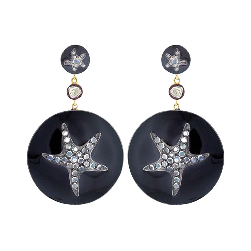 Boucles d'oreilles étoile de poisson en or et argent avec émail noir, diamants et pierre de lune