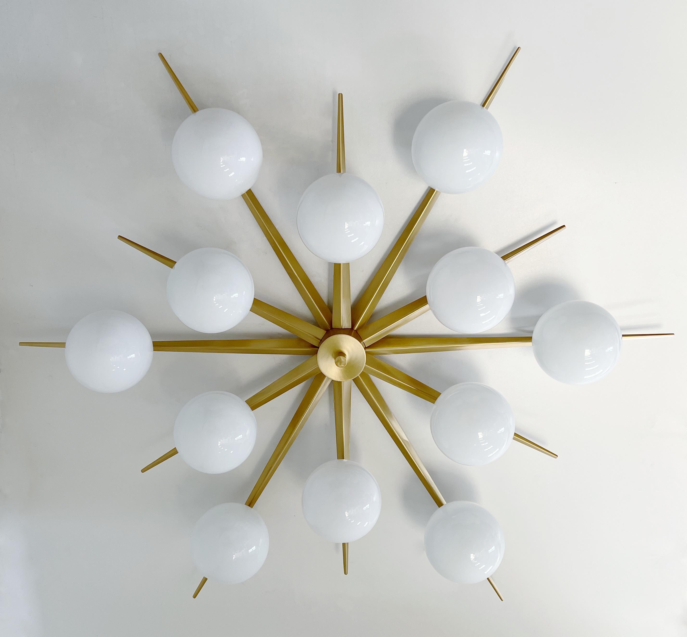 Italian flush mount with 12 large Murano glass globes mounted on brass frame / Made in Italy
Designed by Fabio Ltd, inspired by Angelo Lelli and Arredoluce styles
12 lights / E12 or E14 type / max 40W each
Diameter: 64 inches / Height: 14