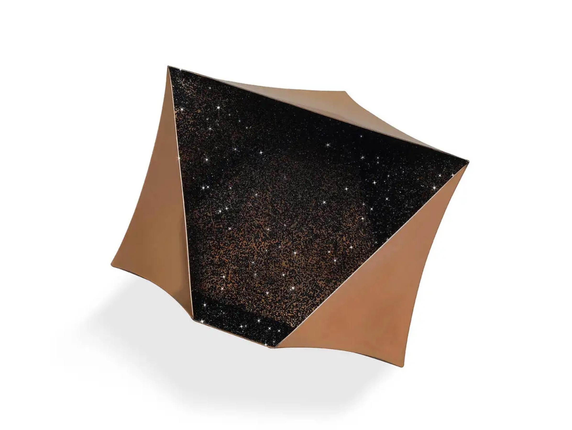 Star is a handmade copper vessel designed by Architect Sir David Adjaye OBE  for GAIA&GINO made in collaboration with Swarovski. This vessel is hand-crafted by  artisans and adorned with black Swarovski crystals inside.

David Adjaye says: