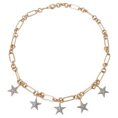 Collar de estrella con cadena tipo gargantilla dorada y colgante esmaltado en azul claro