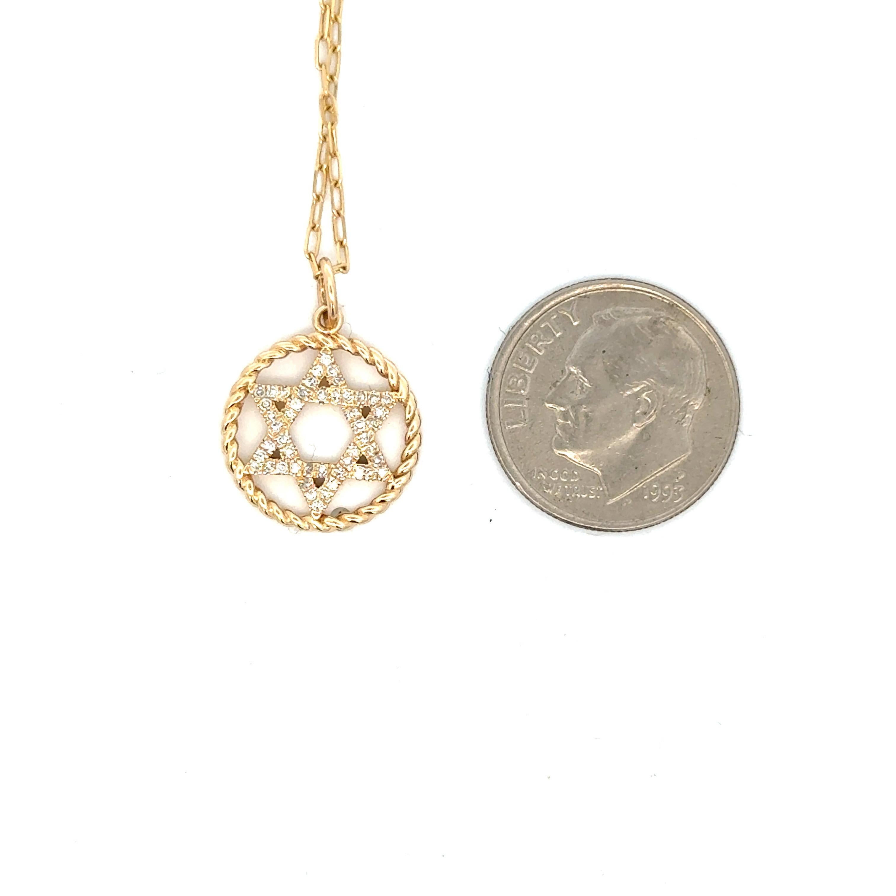 Star of David pendant featuring round brilliants weighing 0.12 carats with a twist motif halo.