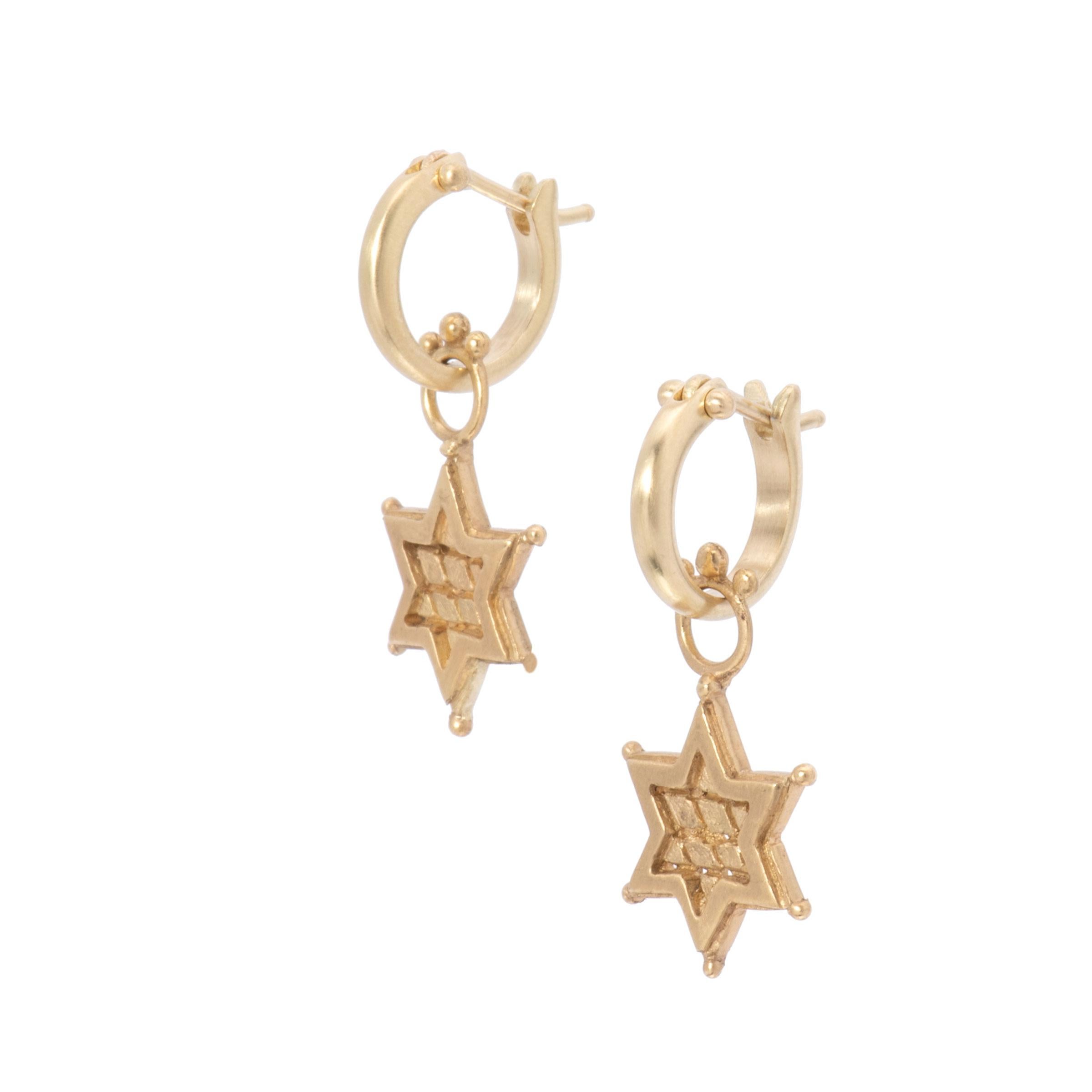 Hand crafted in our studio, the Star of David Drop Earrings in 18k Gold feature 6 beaded points and are crowned with a beaded bail. Hung from our small plain hoops which click shut for security, the gold glows with warmth in our signature satin