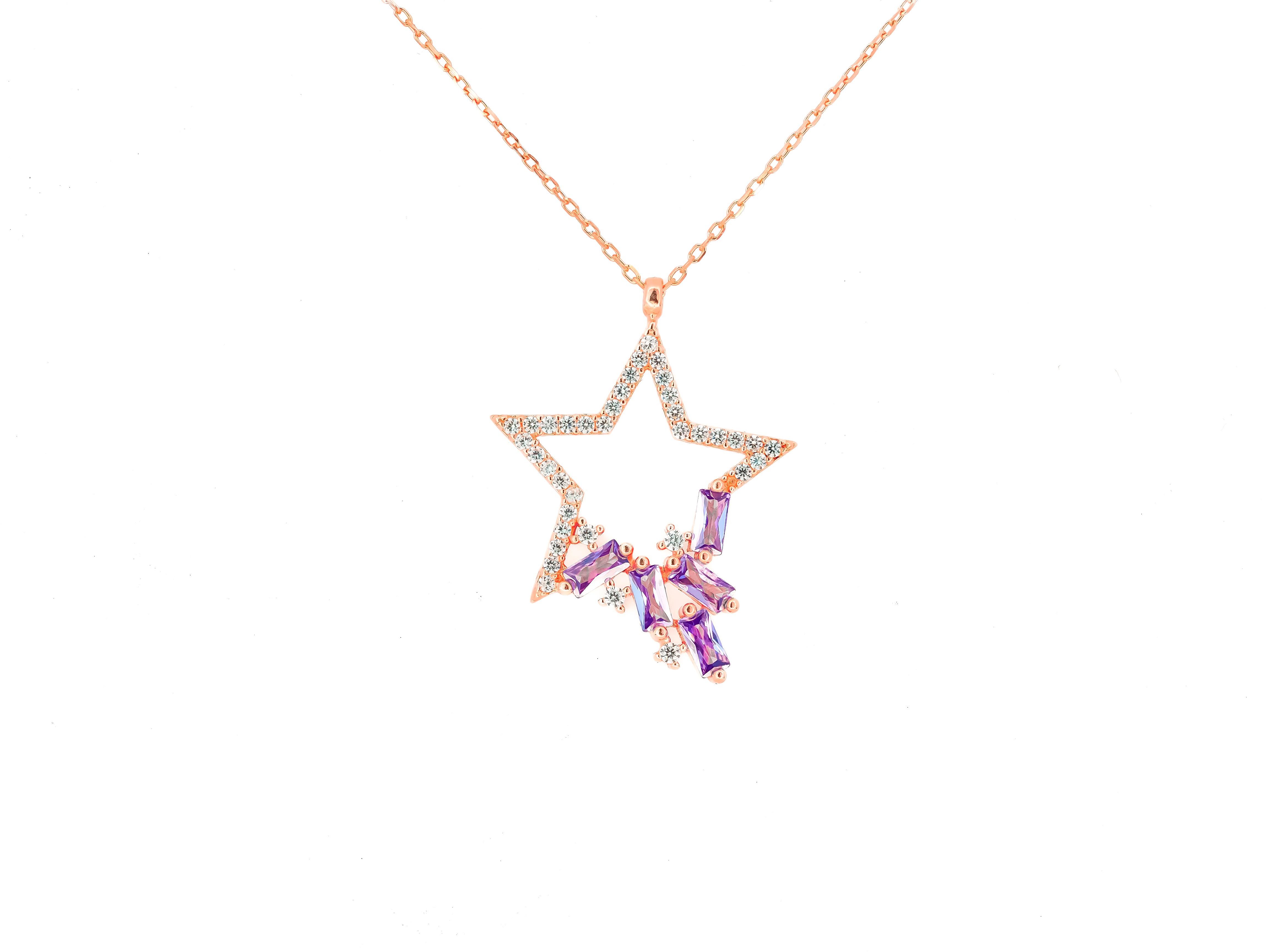 Star pendant with colored gemstones. Chain necklace with star pendant. 

Metal: silver 925, plated with 14k pink gold
Necklace lenght - 42 sm
Star pendant gemstones: white topazs, round cut - 1.2 ct 
Baguette cut amethysts, baguette cut - 5