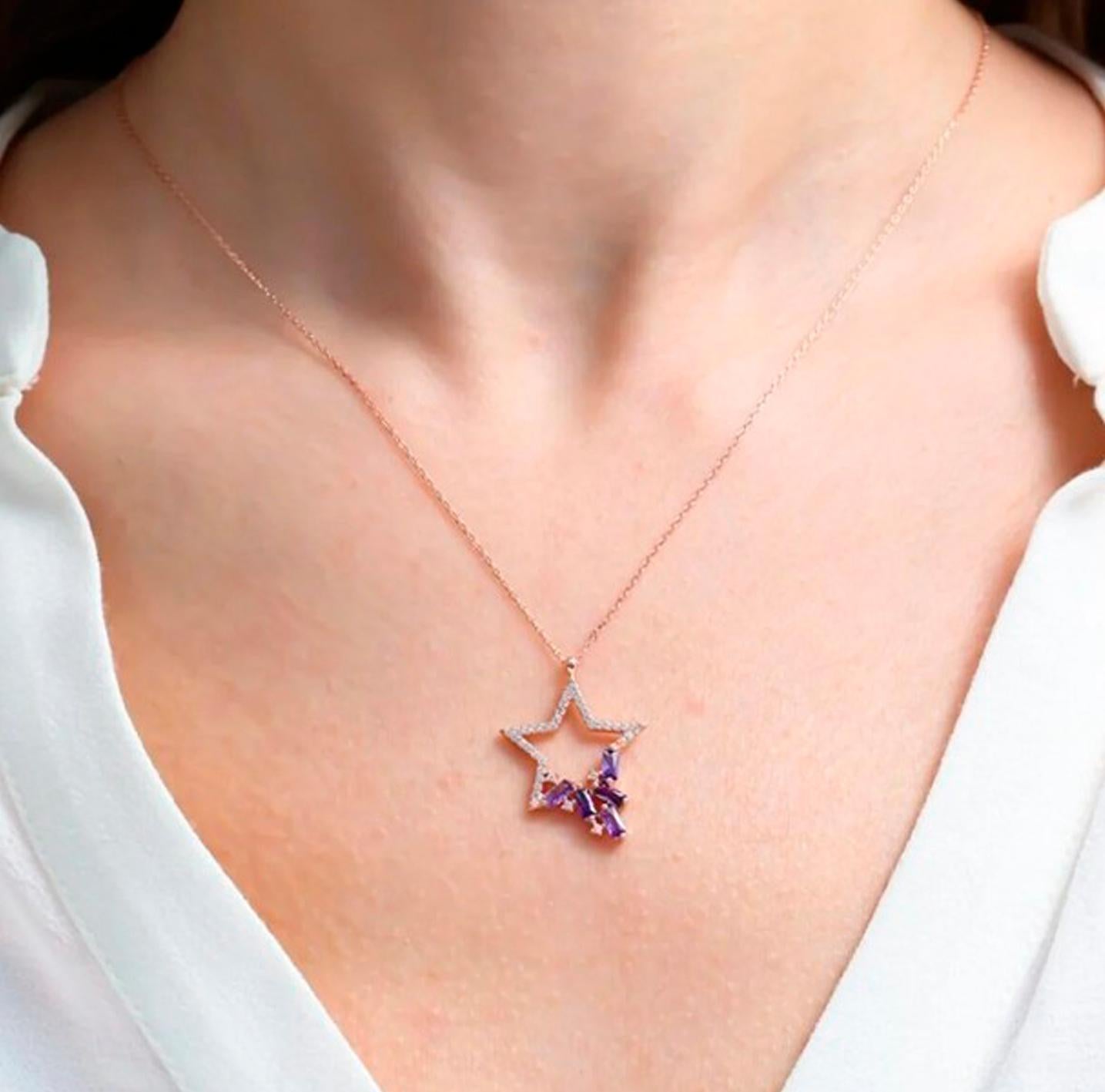 Women's Star pendant necklace with diamonds and amethysts in 14k gold.  For Sale