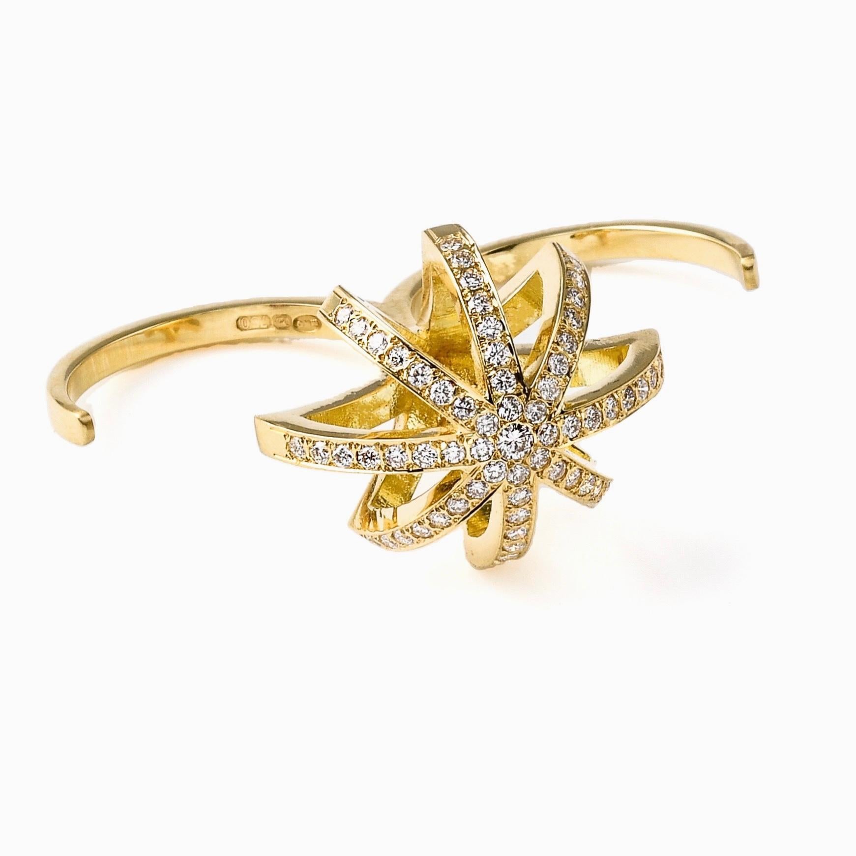 The ‘Reclining Star’, ring is crafted in 18K gold, hallmarked in Cyprus. It comes in a highly polished finish, set with White, VS Diamonds totaling 0,67 Cts. This impressive, two finger ring is specially designed to fit on two fingers comfortably,