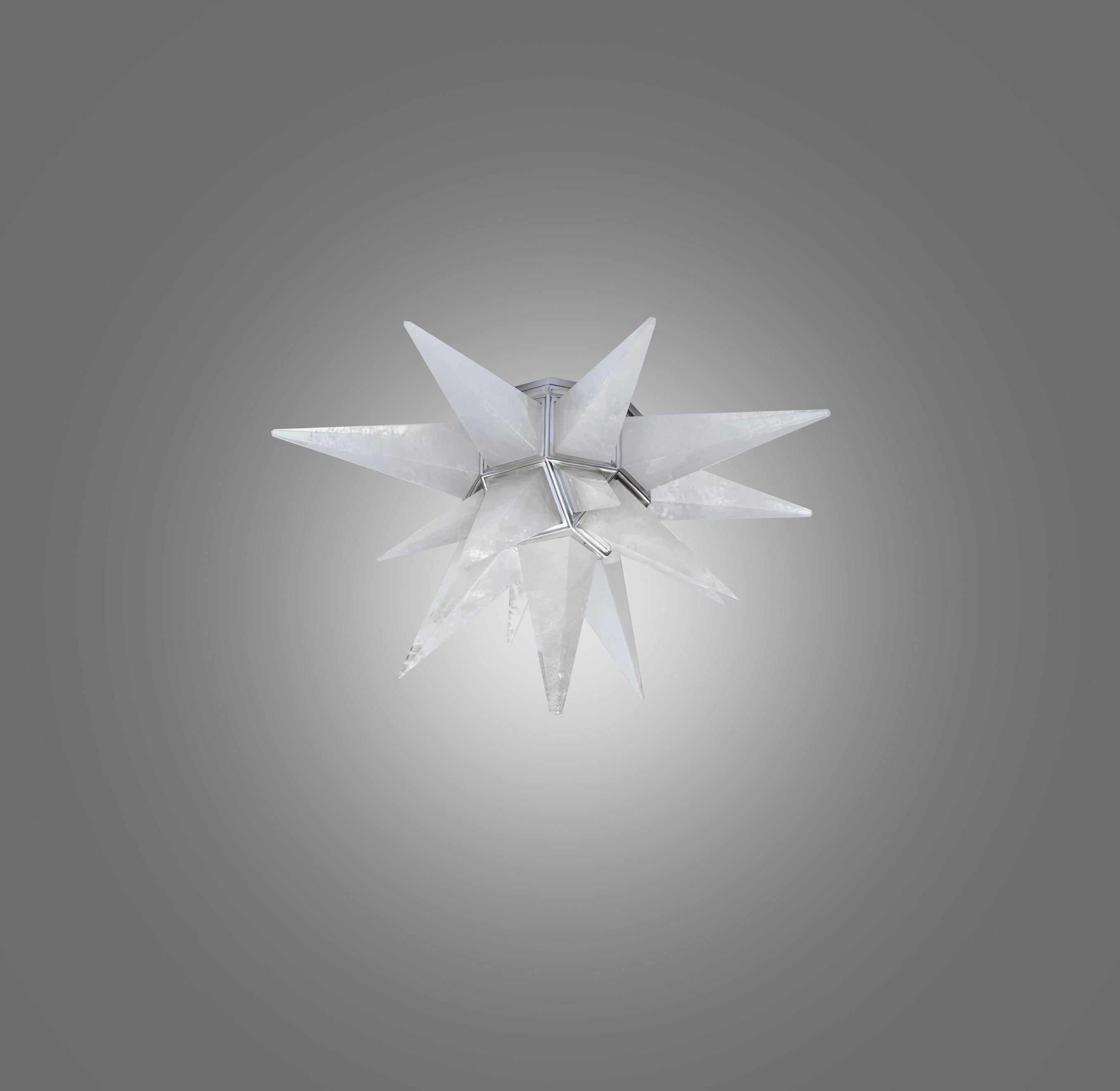 A fine carved star form rock crystal flush mount with matte nickel finished frame, created by Phoenix Gallery, New York City.
Two sockets installed.

 