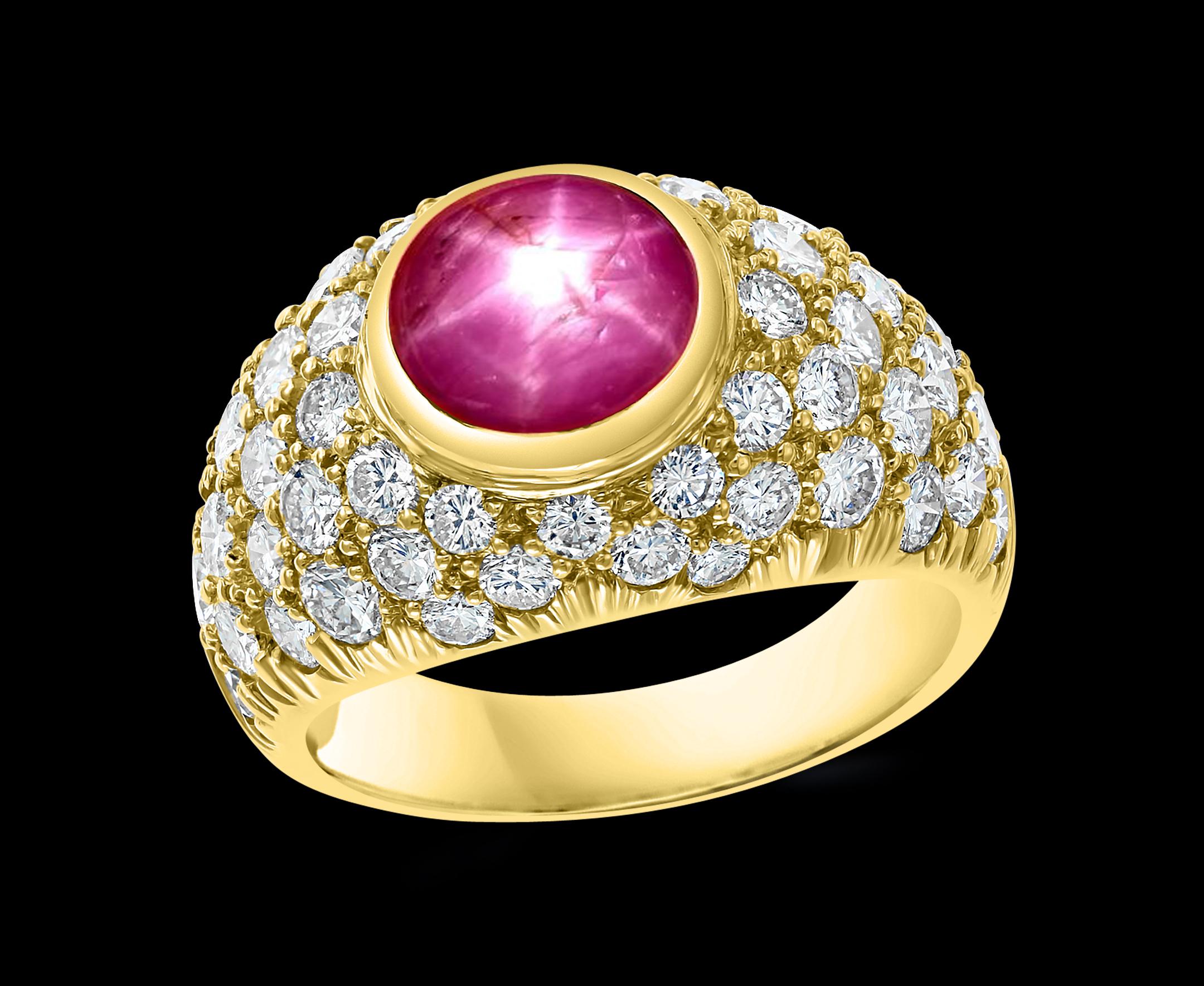 A classic, Cocktail ring 
Approximately  2.5 Carat  or over , of very clean   natural  Cabochon   with star  Ruby  and  Approximately  3.5 Ct Diamond Ring
Star  Ruby Cabochon 2.5 ct or over 
Ruby is not red , its pinkish color like Pink