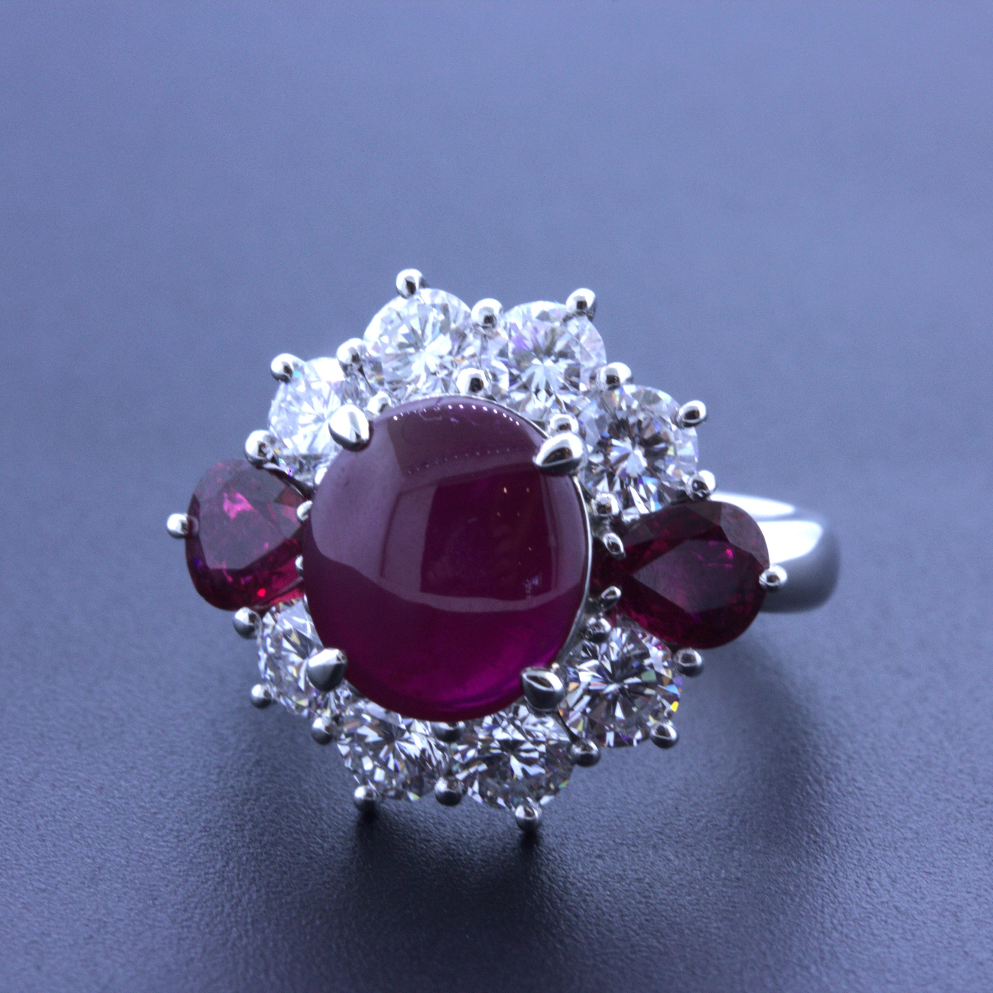 A special ring featuring very fine diamonds and gemstones. The ring features a 3.43 carat star ruby in its center which has an intense red color and a very strong 6-rayed star. When a light hits its top, you can see all 6 rays stretch strongly