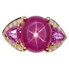 Ring mit Stern-Rubin, rosa Saphir und Diamant in 18 Karat Roségoldfassung