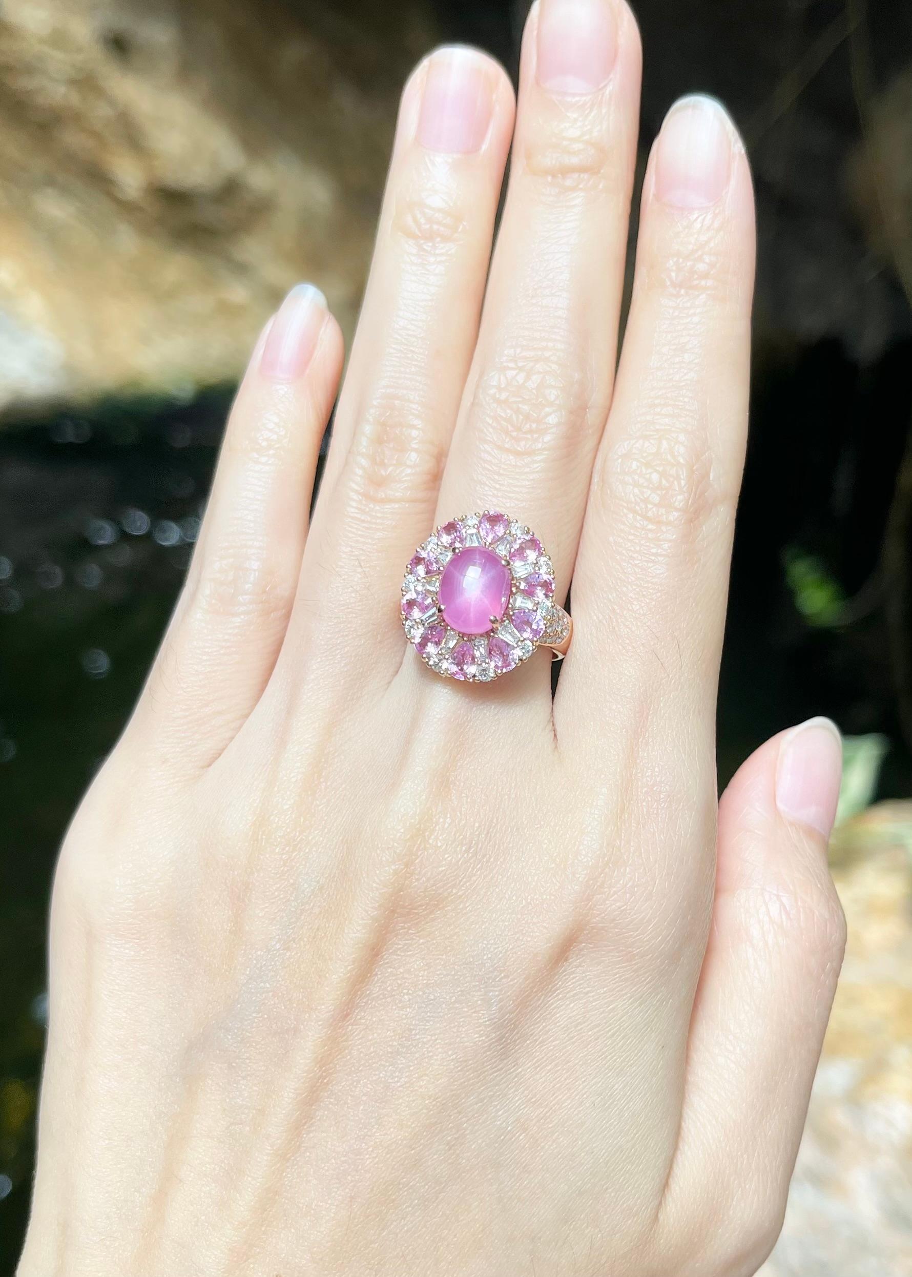Star Ruby 4.80 carats, Pink Sapphire 1.75 carats and Diamond 0.83 carat Ring set in 18K Rose Gold Settings

Width:  1.5 cm 
Length: 1.8 cm
Ring Size: 54
Total Weight: 8.46 grams

Star Ruby
Width:  0.7 cm 
Length: 0.9 cm

