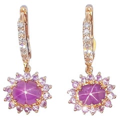 Boucles d'oreilles en or rose 18 carats avec rubis étoilé, saphir violet et diamant 