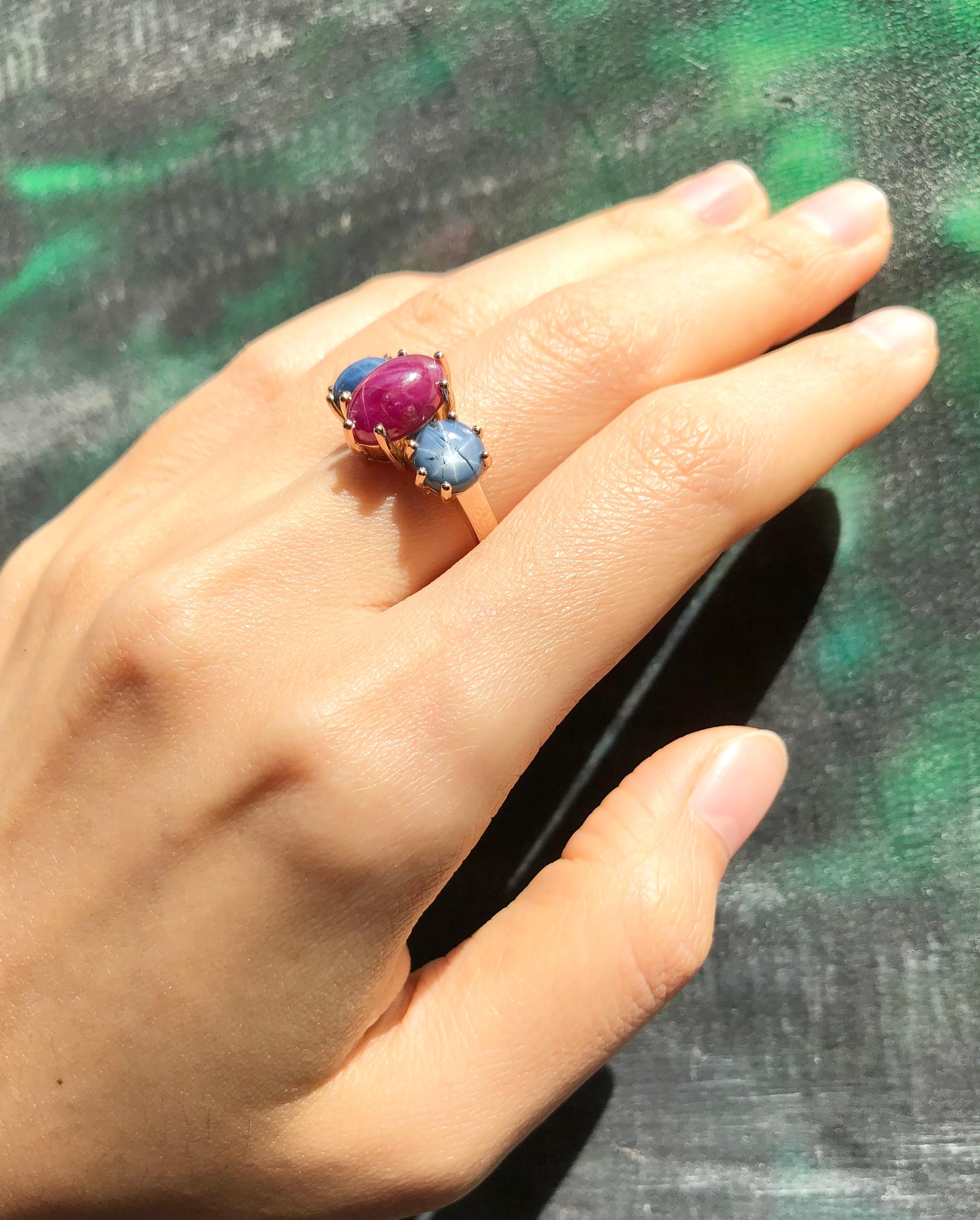 Contemporary Star Ruby with Blue Star Sapphire Ring Set 18 Karat Rose Gold Settings For Sale