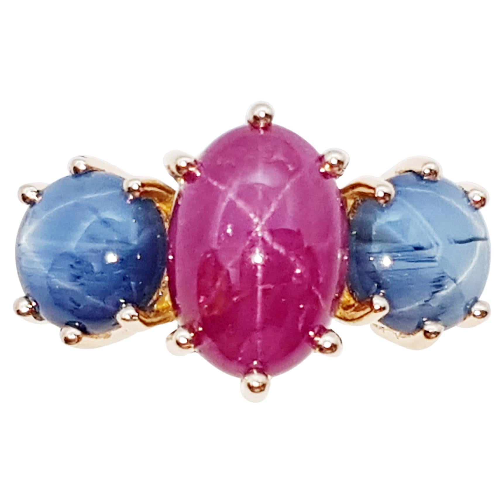 Star Ruby with Blue Star Sapphire Ring Set 18 Karat Rose Gold Settings For Sale