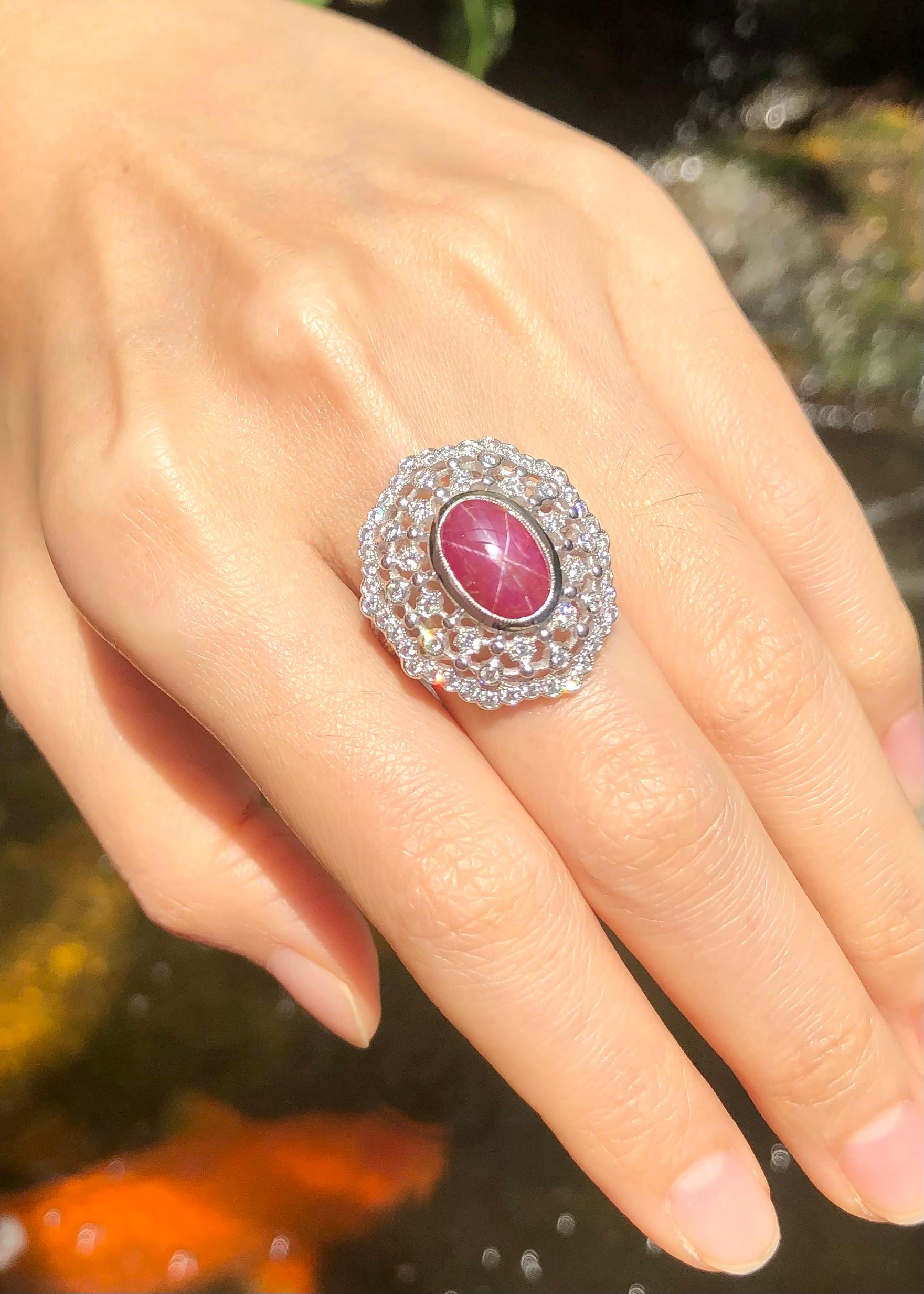 Star Ruby 5.94 carats with Diamond 0.81 carat Ring set in 18 Karat White Gold Settings

Width:  2.0 cm 
Length: 2.5 cm
Ring Size: 53
Total Weight: 9.46 grams


