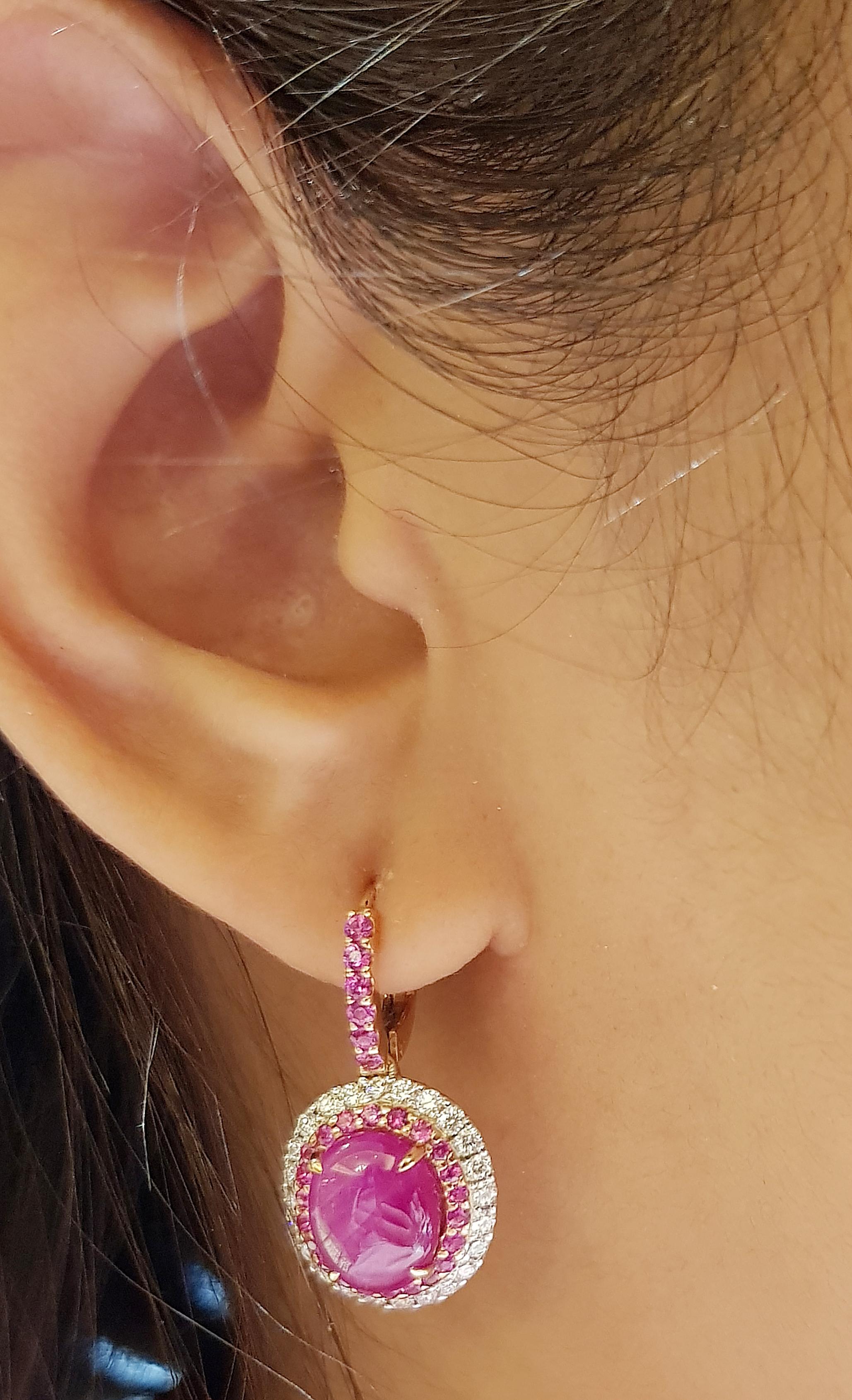 Star Ruby 8.01 carats with Pink Sapphire 0.80 carat and Diamond 0.70 carat Earrings set in 18 Karat Rose Gold Settings

Width:  1.3 cm 
Length: 2.5 cm
Total Weight: 8.46 grams

