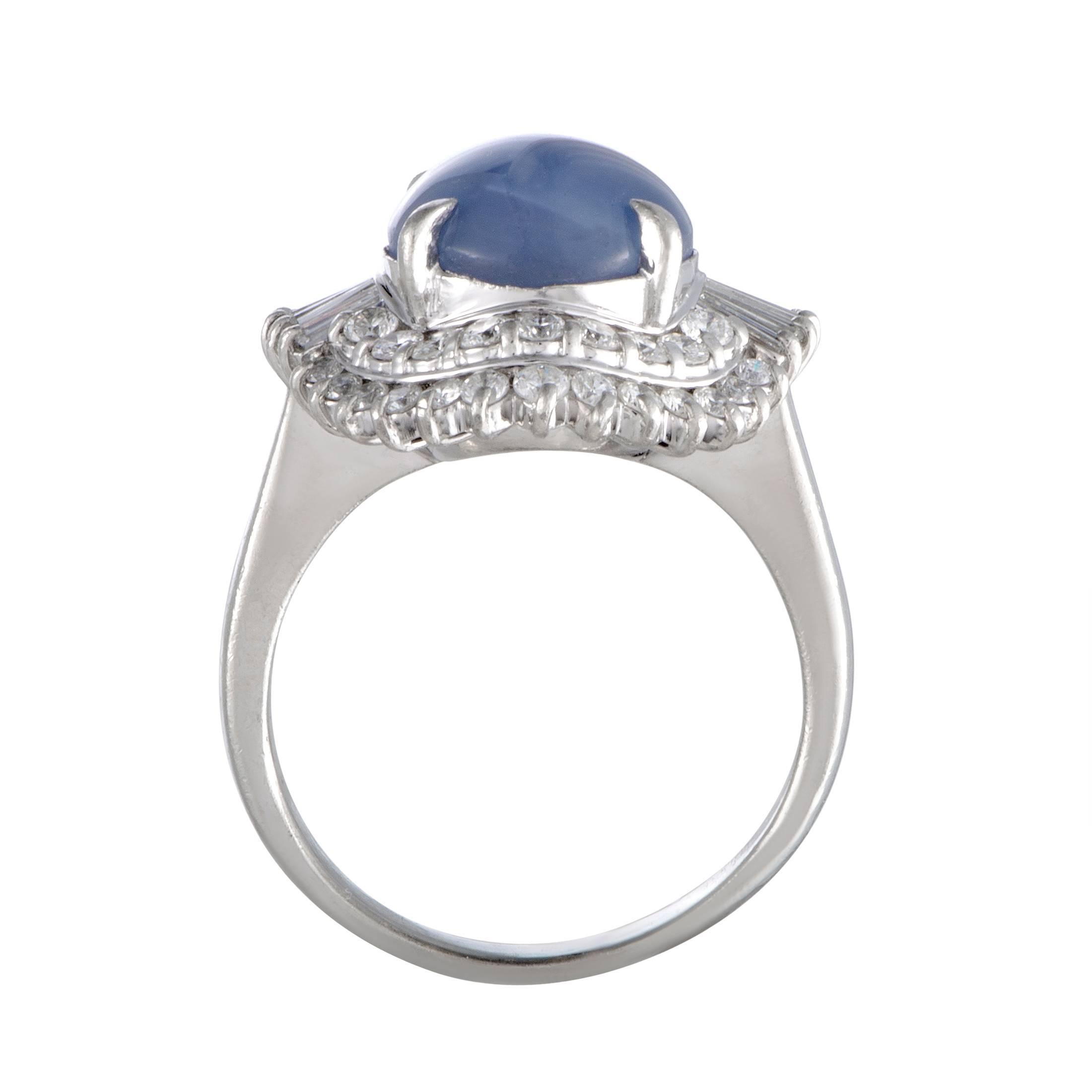 The harmonious blend of scintillating diamonds and sublime star sapphire decorates this ring in the most splendid manner, giving it a stunningly sophisticated appeal. The ring is made of platinum and boasts a total of 1.41 carats of diamonds, while