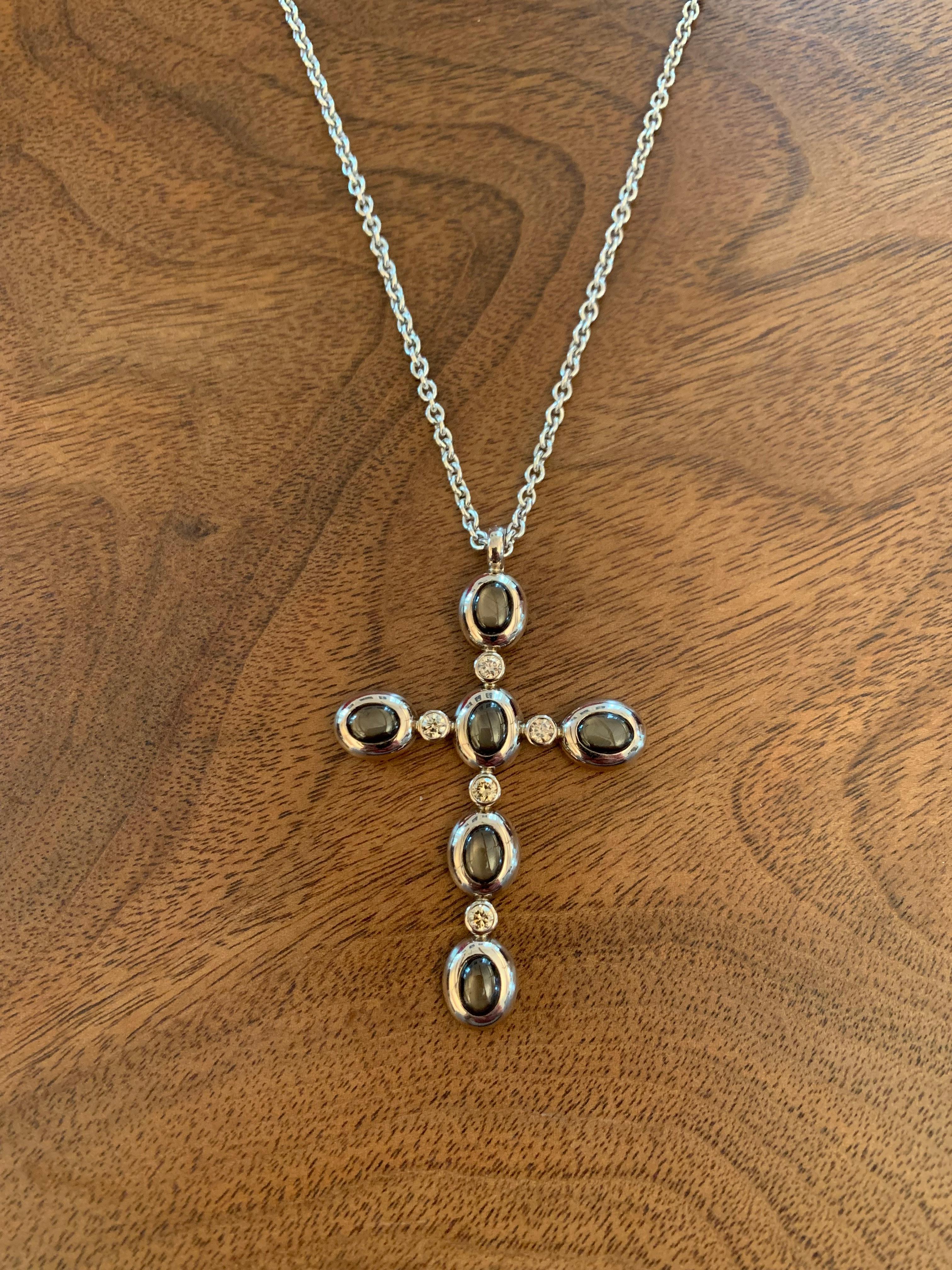 Contemporary Cross Pendant, 18K White Gold, Star Sapphires 6.66 ct, Diamonds 0.65 ct  For Sale