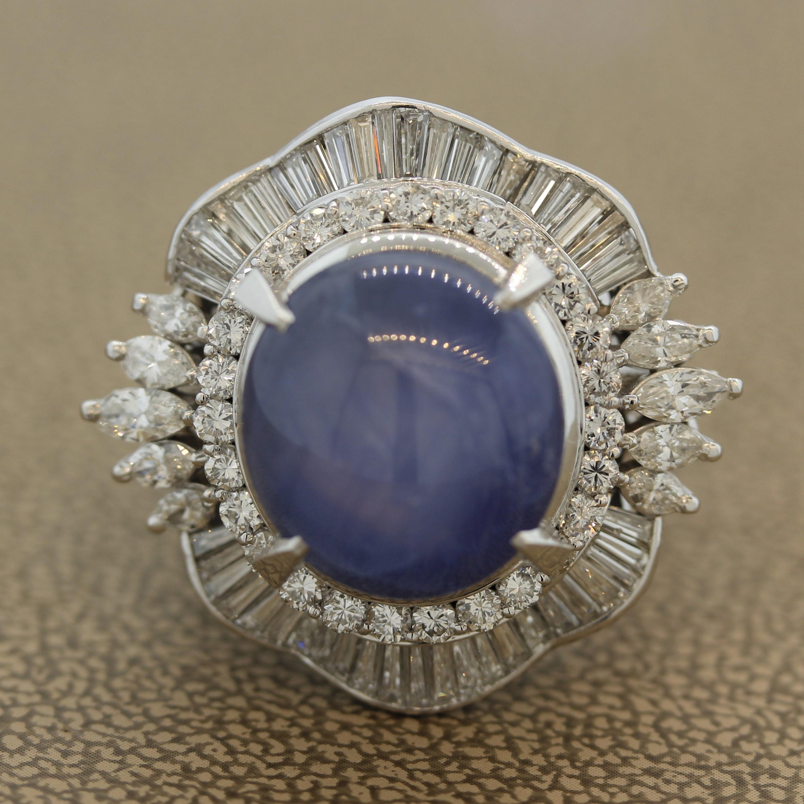 A superb diamond setting housing a 16.55 carat natural star sapphire. A blue star sapphire has a very strong 6-ray star which is best seen when a light it’s the surface of the stone. It is also centered perfectly on the sapphire and ear ray of the