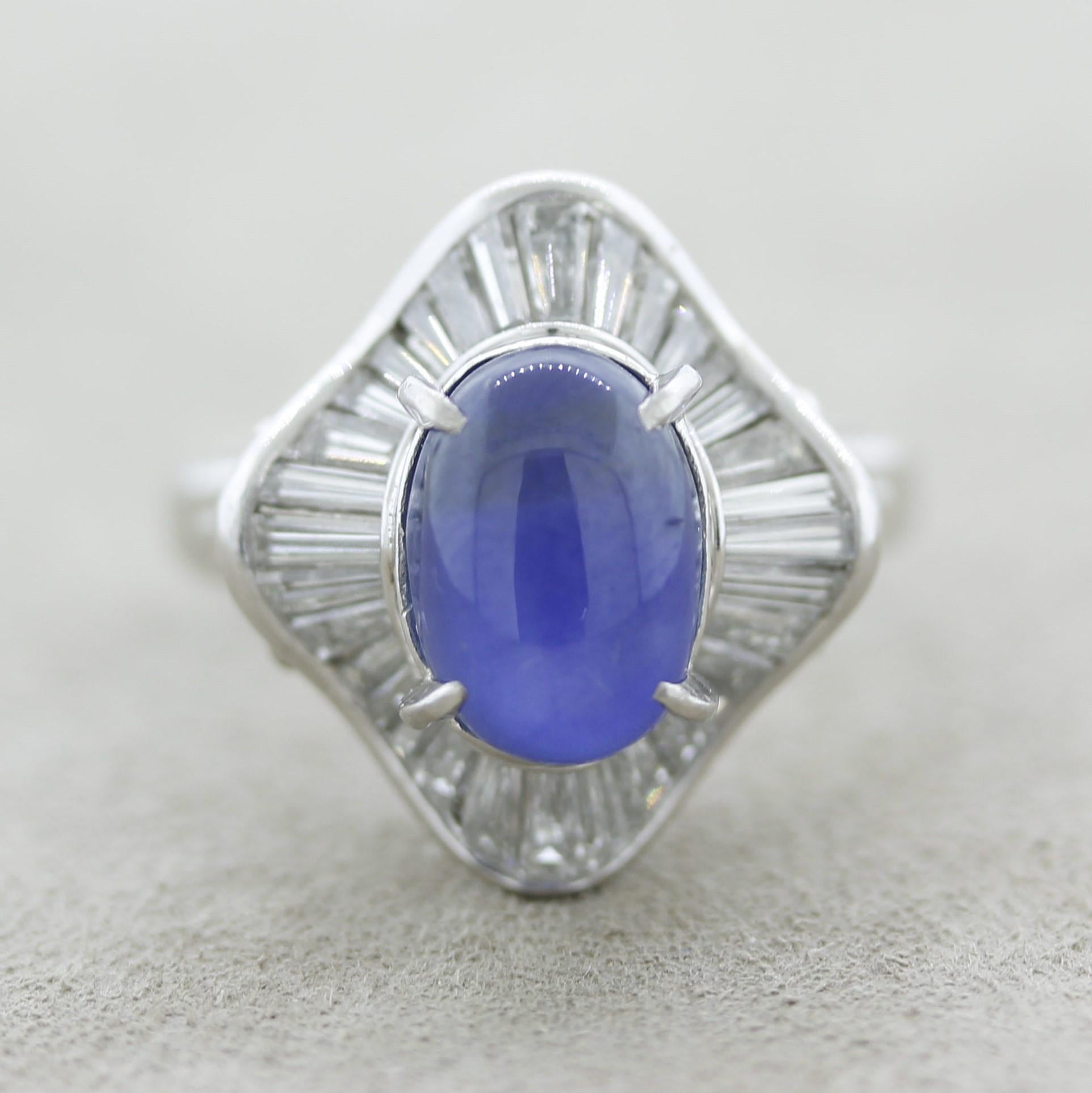 A sleek and stylish ring featuring a 6.18 carat star sapphire with a rich blue color. Adding to that it has a strong 6-rayed star (asterism) when a light hits the stone. Can be seen quite well in direct sunlight. It is complemented by 1.18 carats of