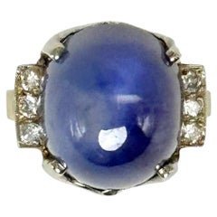 Ring aus 14 Karat Weißgold mit Sternsaphir und Diamant