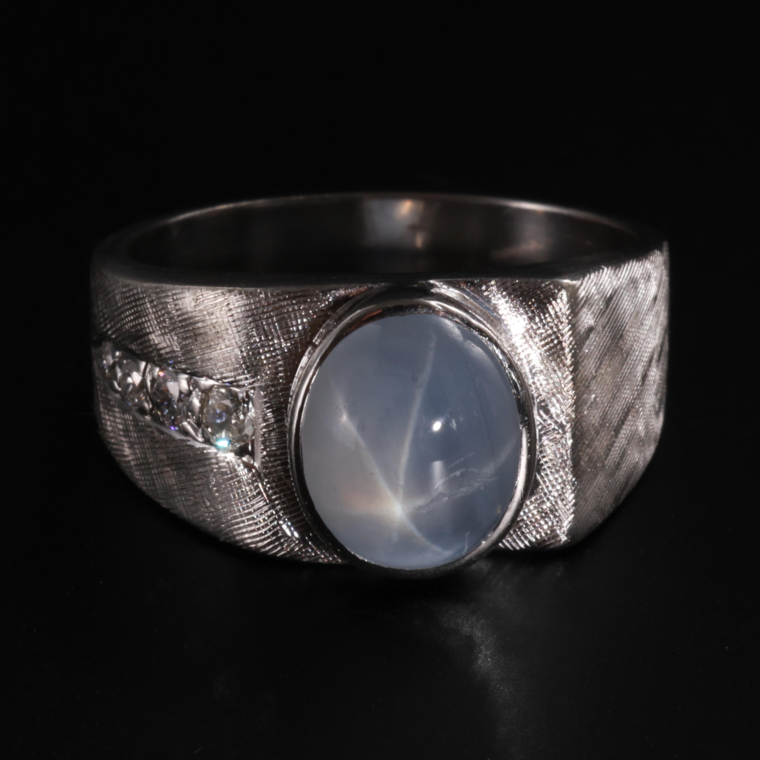 This 14K white gold star sapphire ring was created in the 1950s or early 1960s and apparently locked away in a safe until I came along. The hand-etched Florentine finish is not only impeccably executed by the jeweler who created this fine ring, but