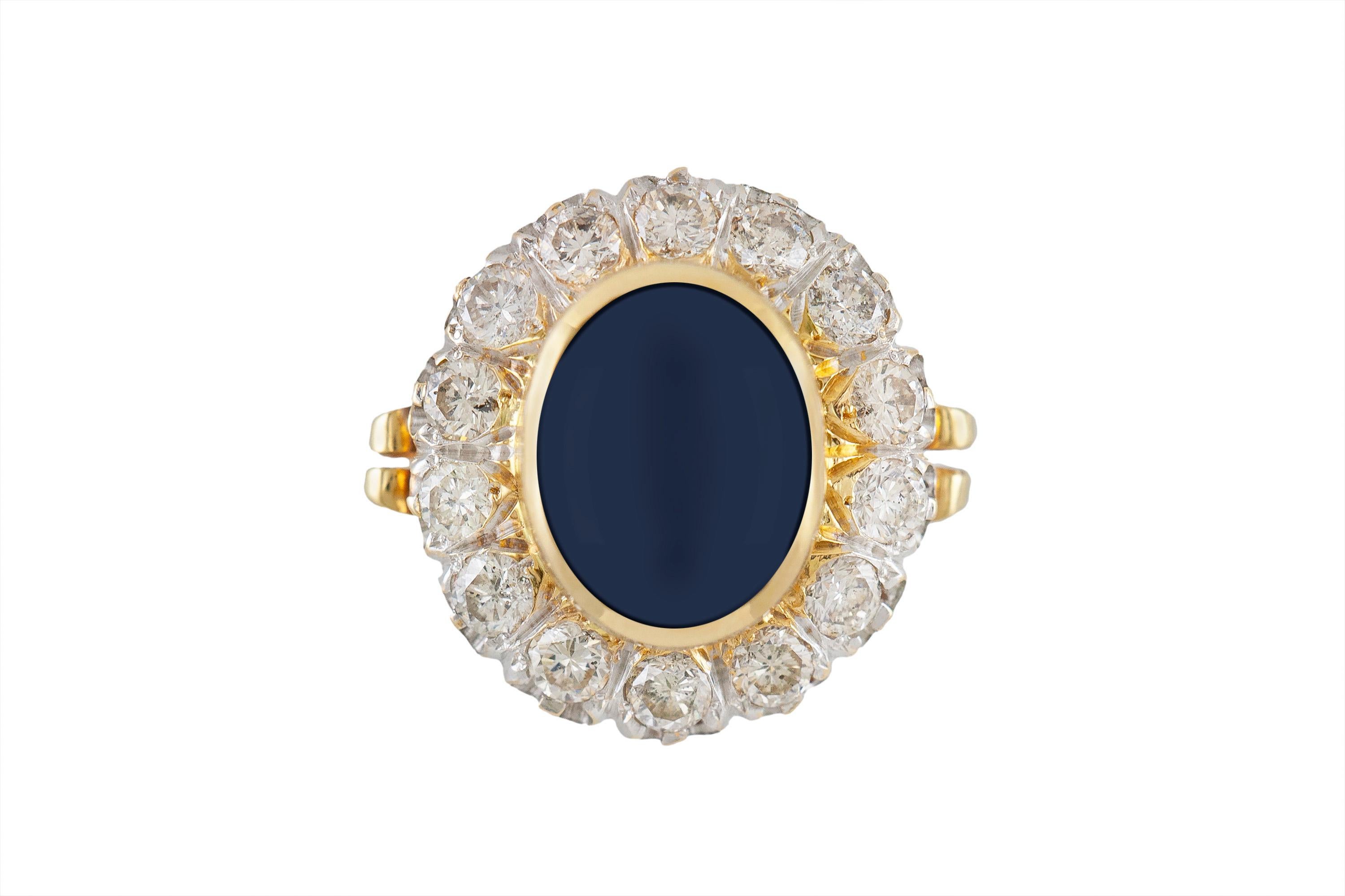 the ring is finely crafted in 14k yellow gold with 3.00 star sapphire center stone and diamonds weighing approximately total of 1.20 carat.