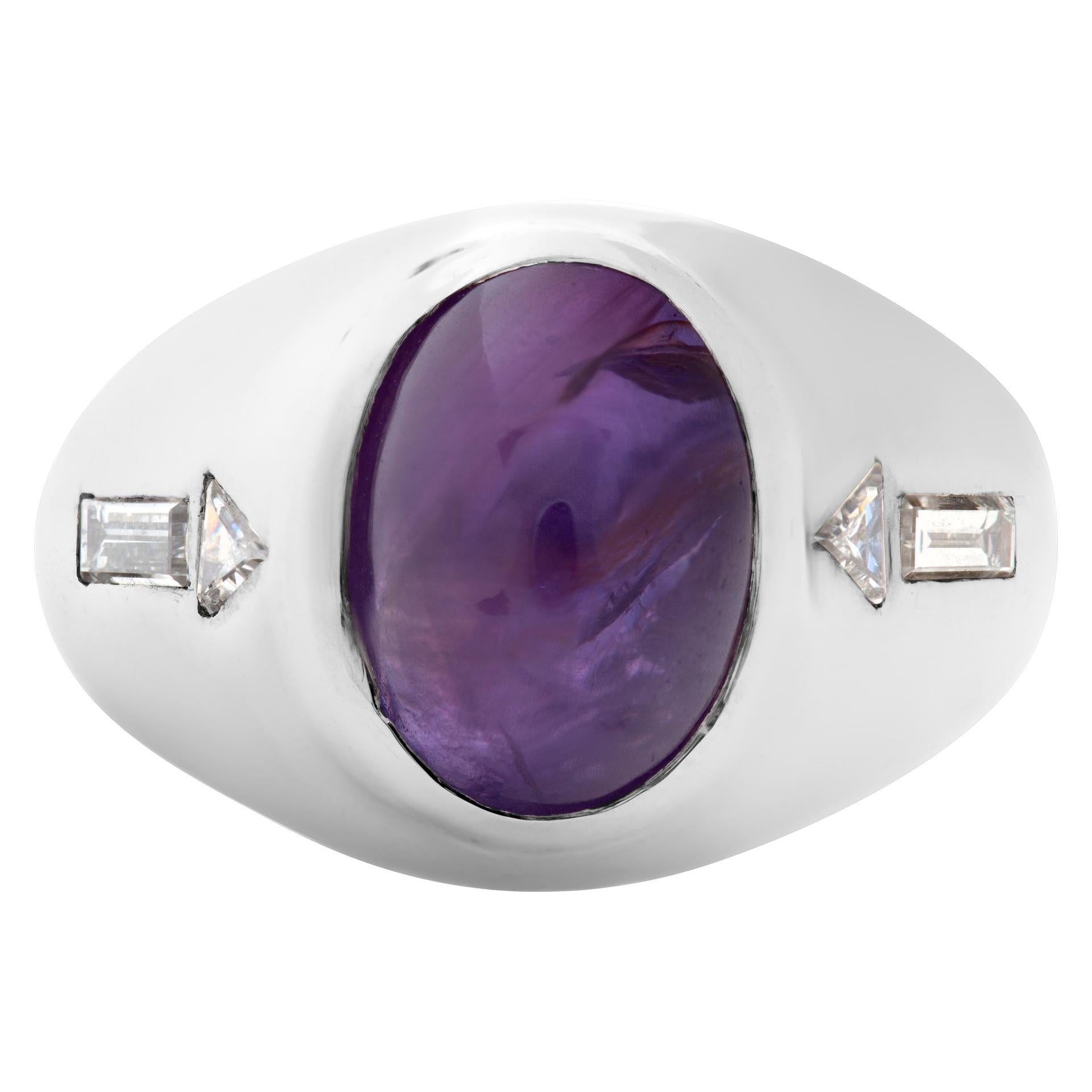 Beautiful Pirple Star Sapphire cabochon ring (app. 2 carats) set in 14k white gold with baguette and triangle diamond accents. Size 6.25. Width at head: 13.0mm, width at shank: 4.0mm.

This Sapphire ring is currently size 6.25 and some items can be