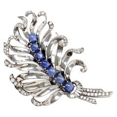 Star Sapphires and Diamonds Platinum Feather Brooch, circa 1950