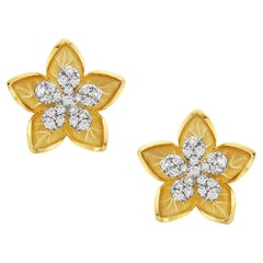 Star Shaped Carved Stud Earrings in 14k Yellow Gold with Diamonds in the Center