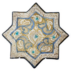 Piastrella di ceramica a forma di stella, probabilmente di scuola persiana