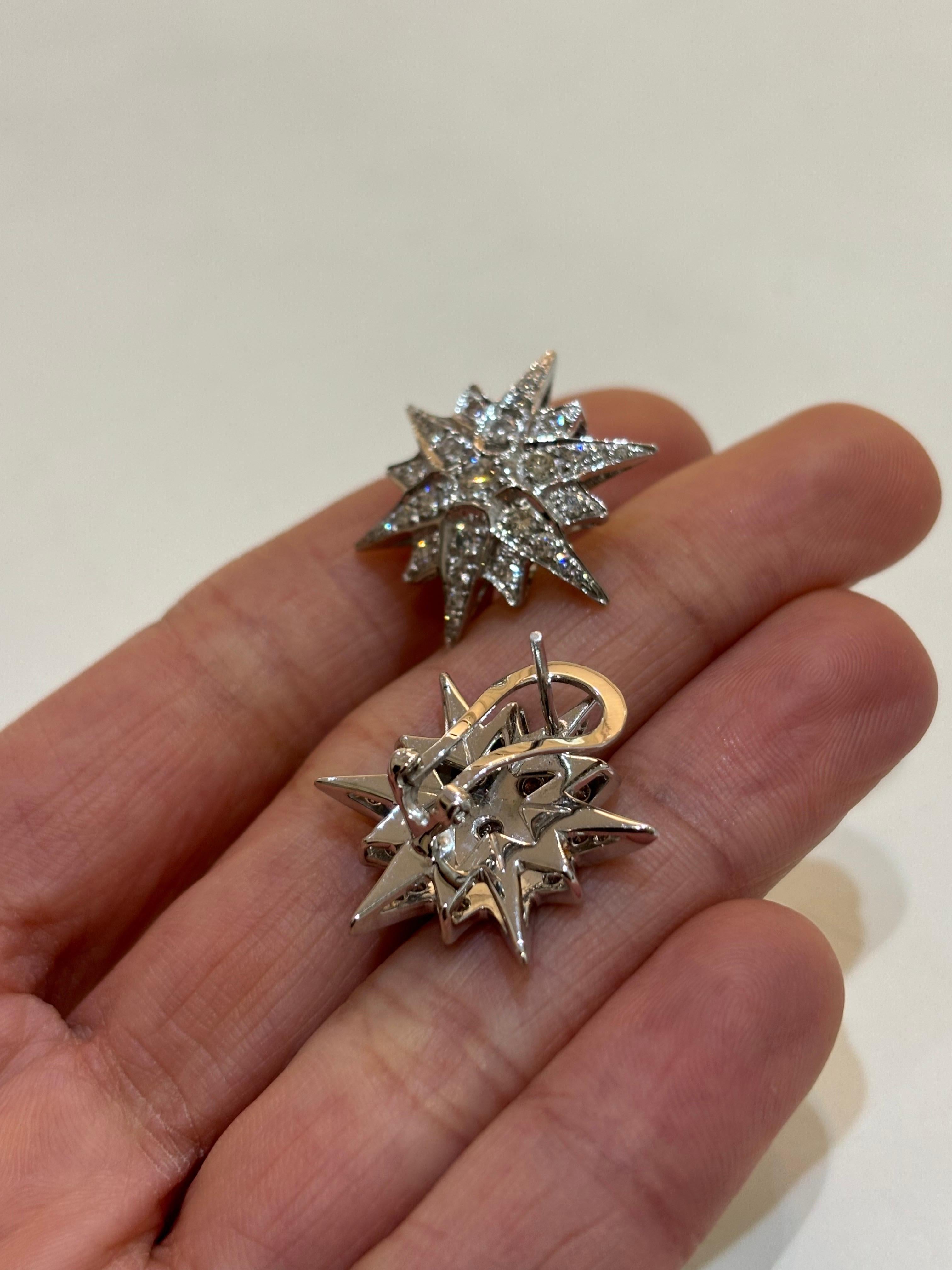 A beautifully handcrafted star shaped 14K Gold and Diamond studs, with a lever backing. A total of 1.5 carats of brilliant cut White Diamonds are used. 
We provide free shipping, and accept returns to our local address in the US. 
Please feel free