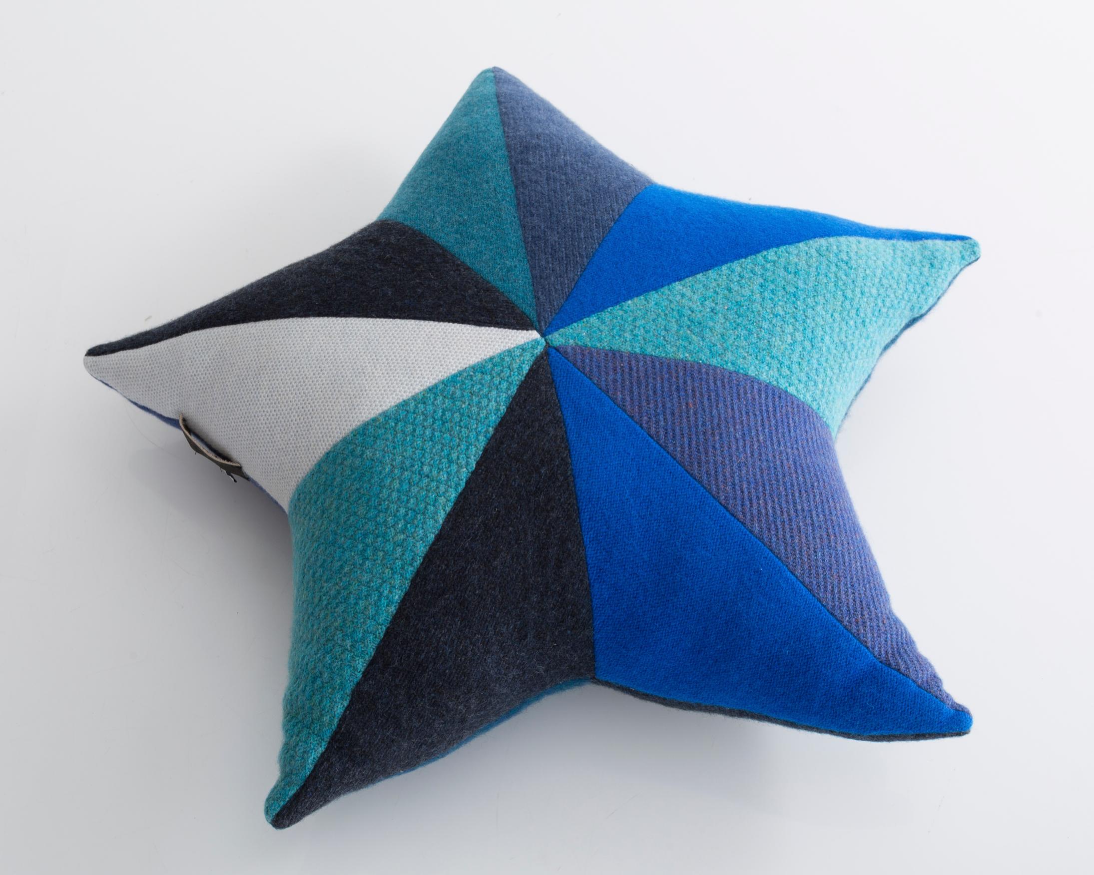 Unique star-shaped patchwork pillow in blue cashmere. Designed and made by Greg Chait, USA, 2017.