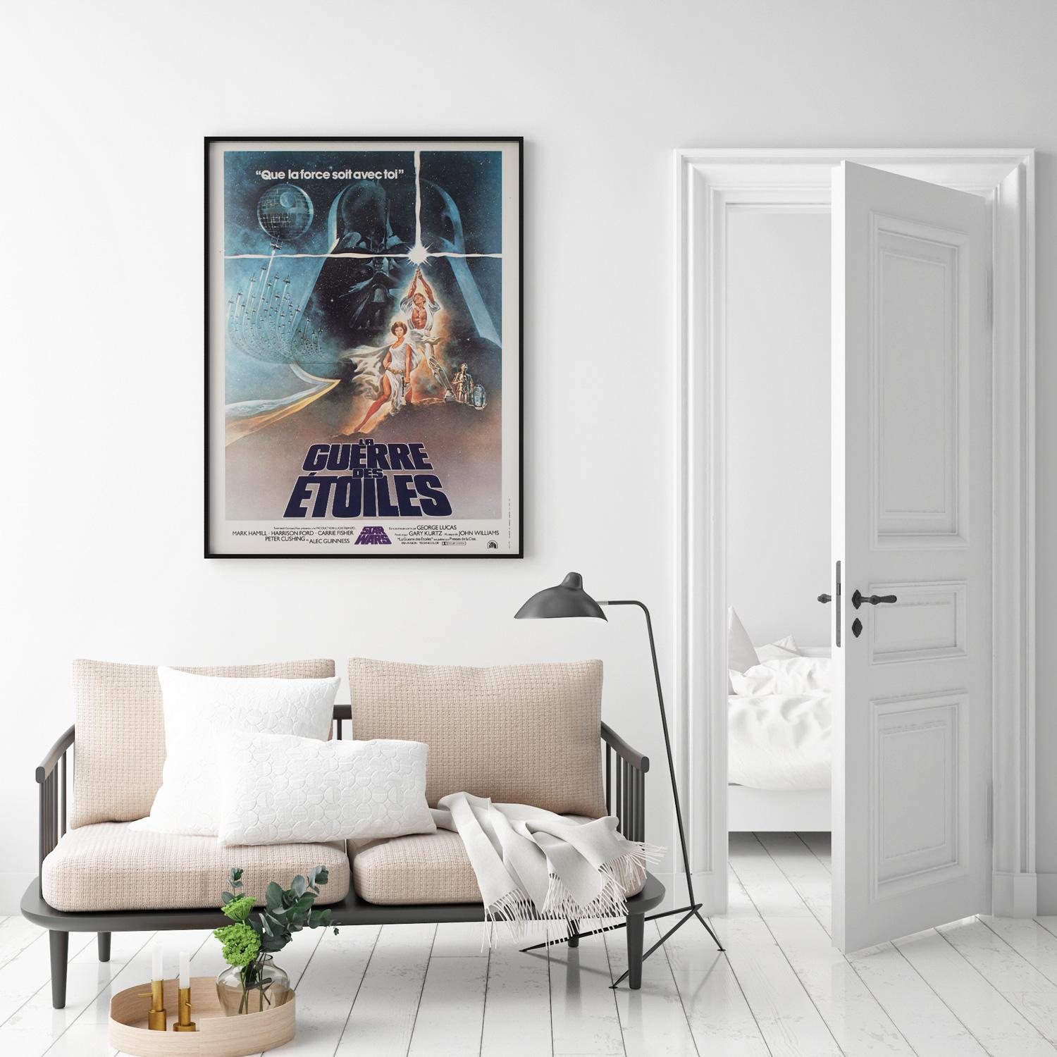Fantastic first-year-of-release French Moyenne film poster for Star Wars featuring Tom Jung's classic design. In wonderful Near Mint/Mint linen-backed condition.

This original vintage movie poster has been professionally linen-backed is sized an