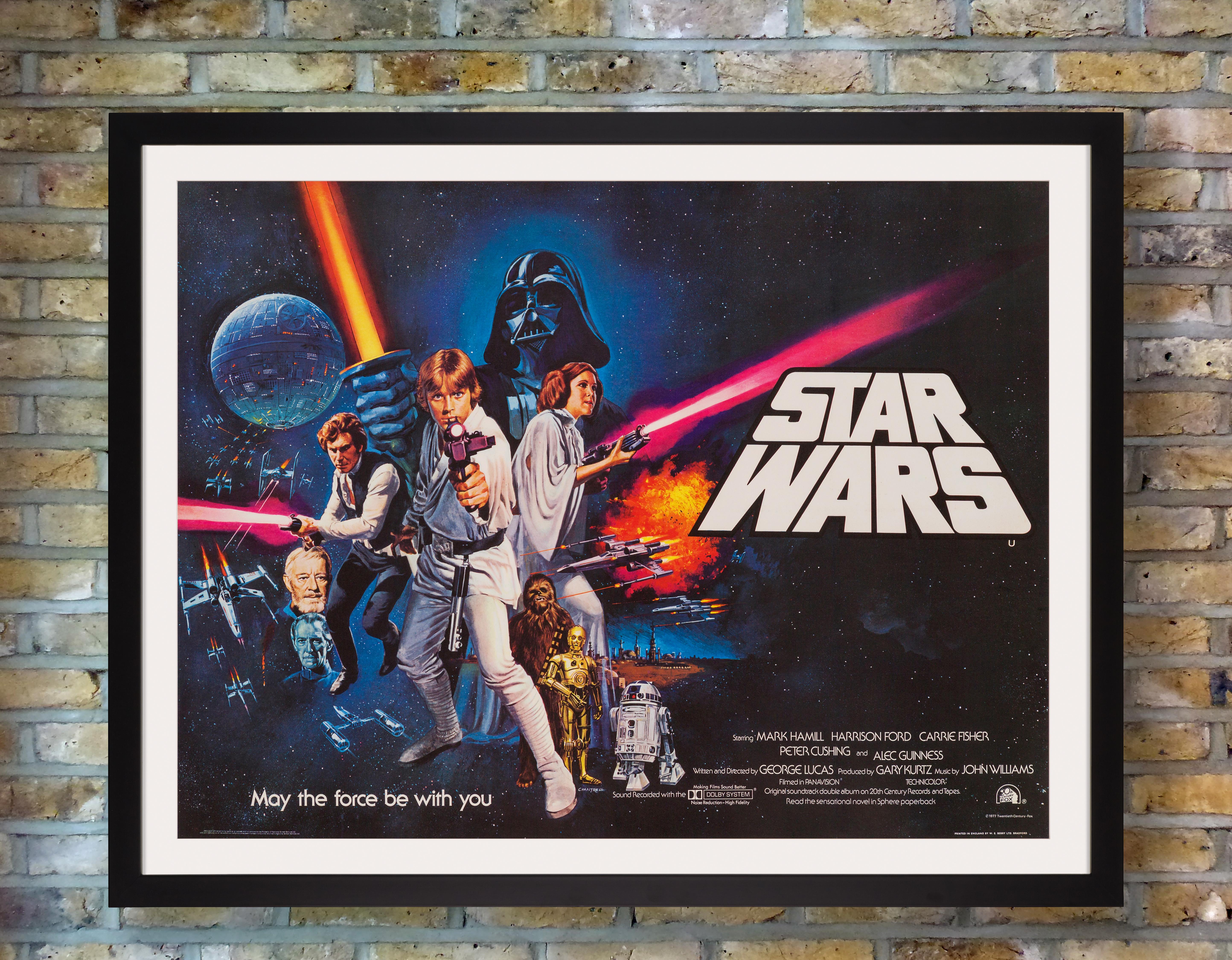 A rare British quad for the first instalment of George Lucas' original, genre-defining, sci-fi trilogy 'Star Wars'. When the studio realized how successful the first film was going to be, they commissioned Tom Chantrell to create this bold, action