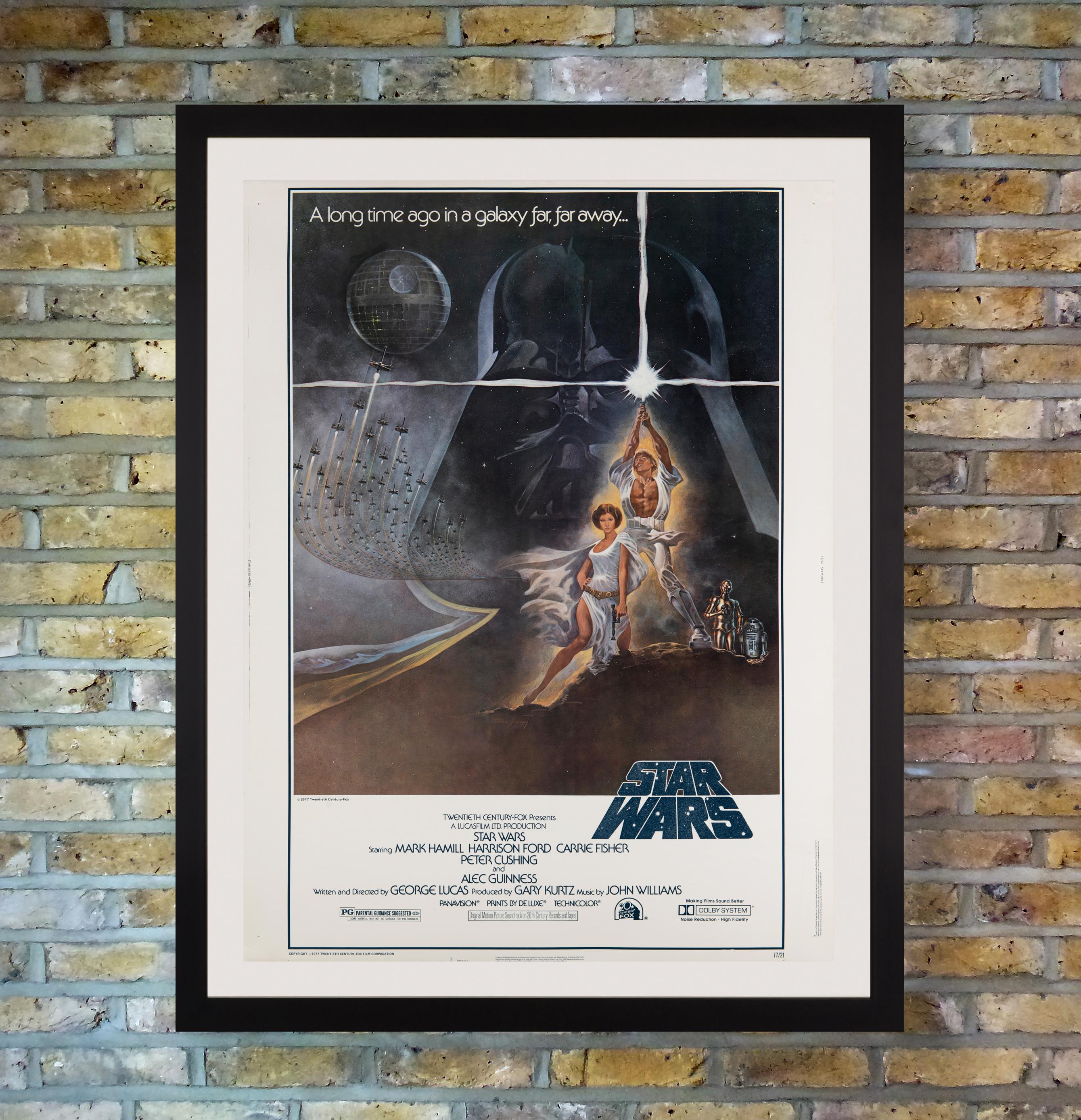 A rare US 30x40 cardstock poster for the first instalment of George Lucas' original, genre-defining, sci-fi trilogy 'Star Wars,' featuring Tom Jung's famous 'Style A' artwork designed for the more commonly seen US 'Style A' One Sheet posters, which